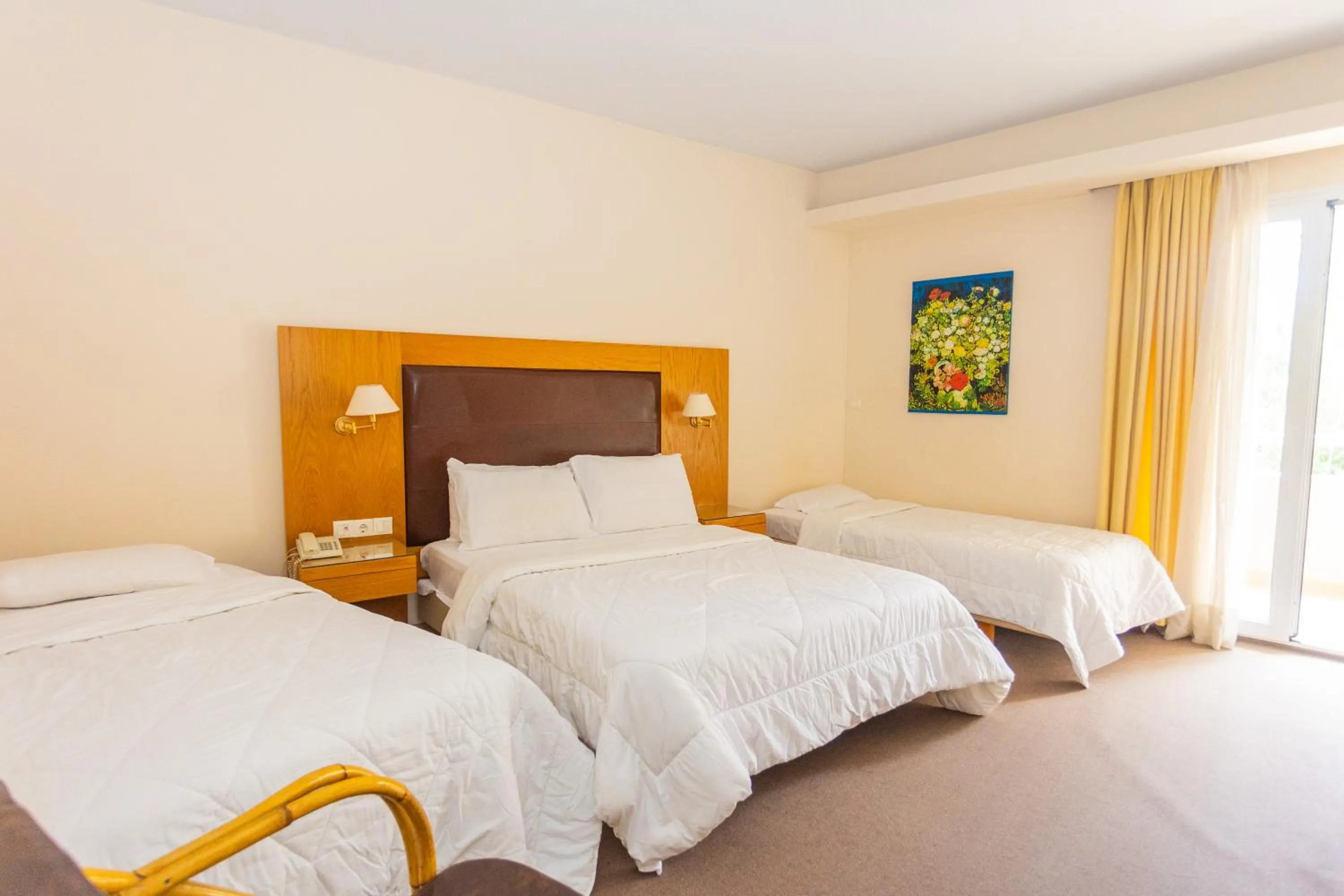 Bed in Hotel Aspassia