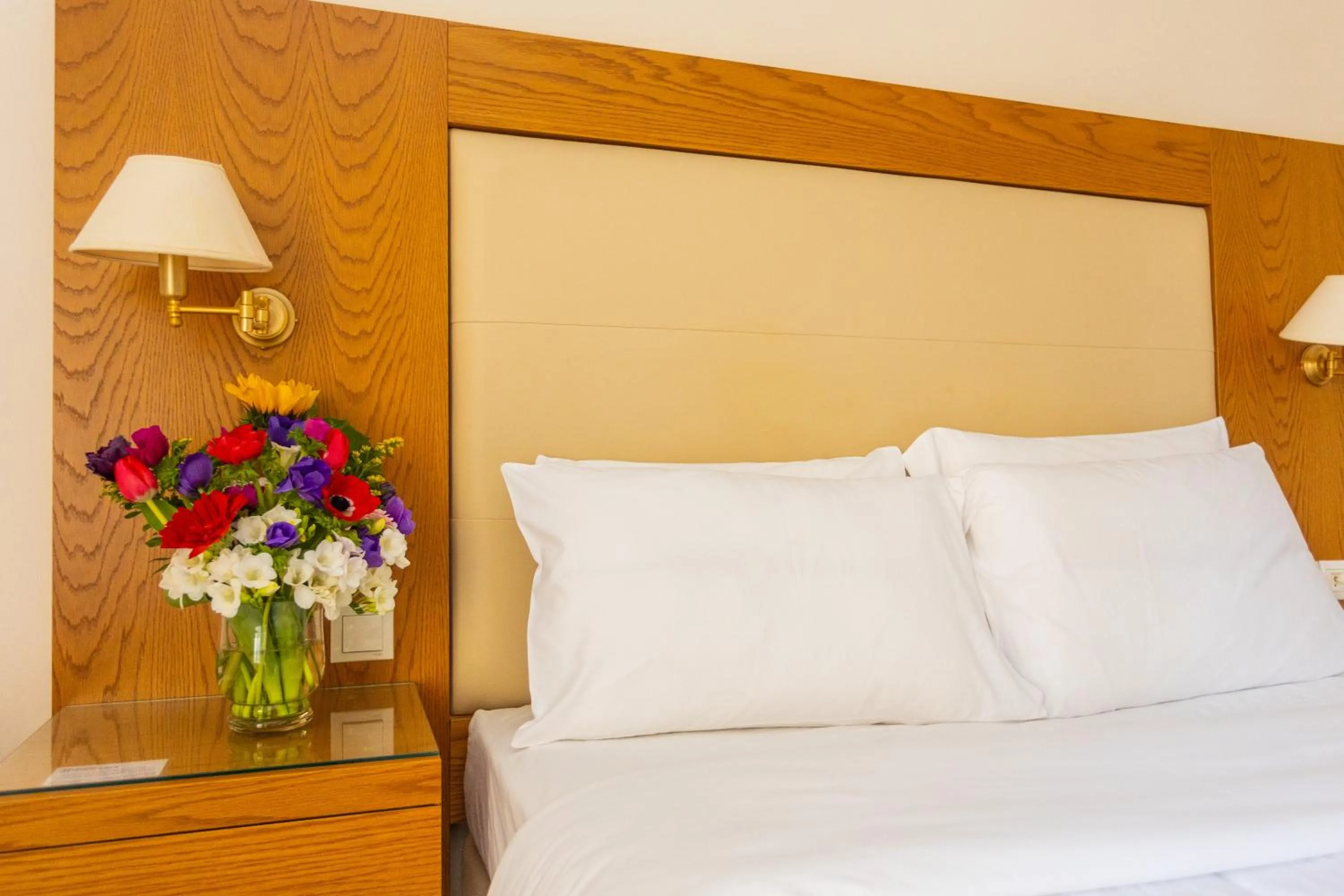 Bed in Hotel Aspassia