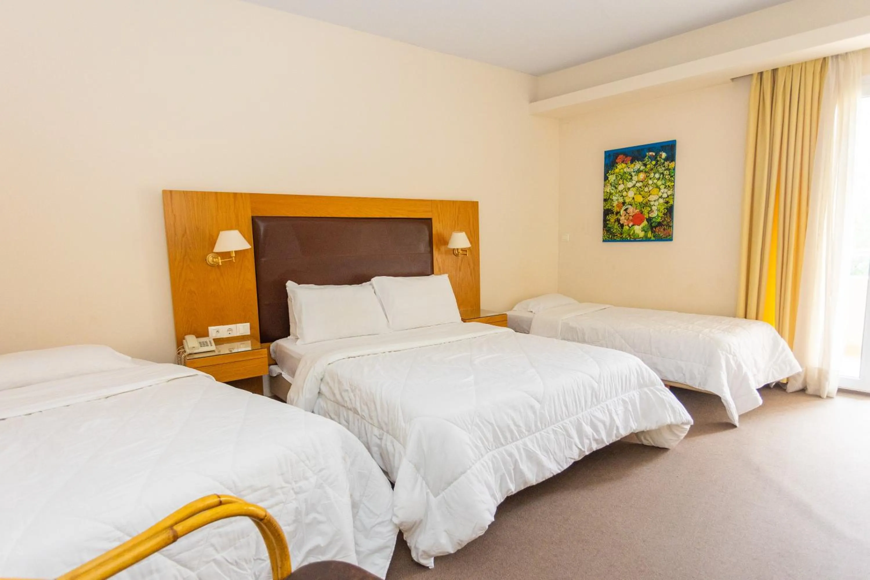 Bed in Hotel Aspassia