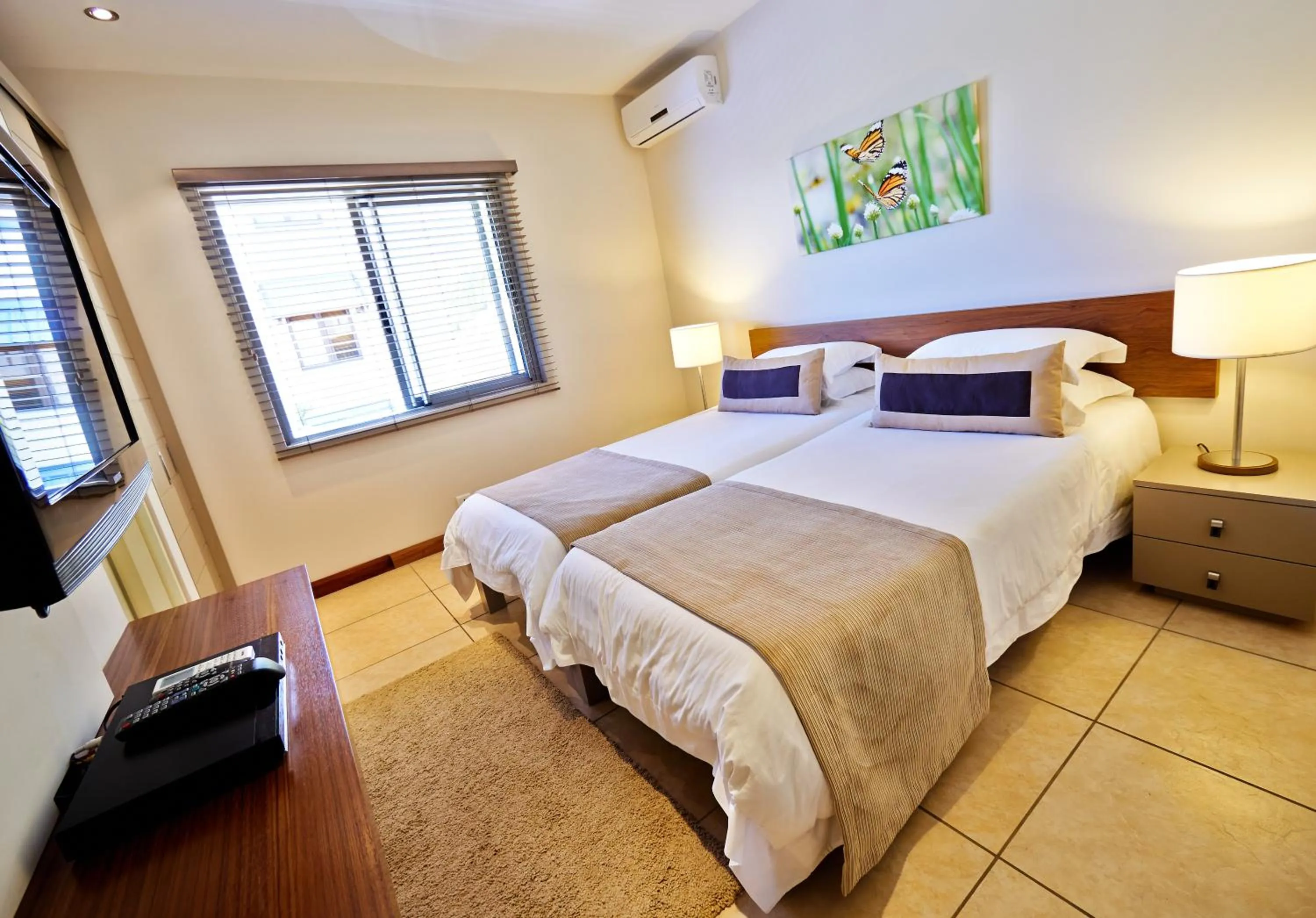 Bed in Bon Azur Beachfront Suites & Penthouses by LOV Mauritius