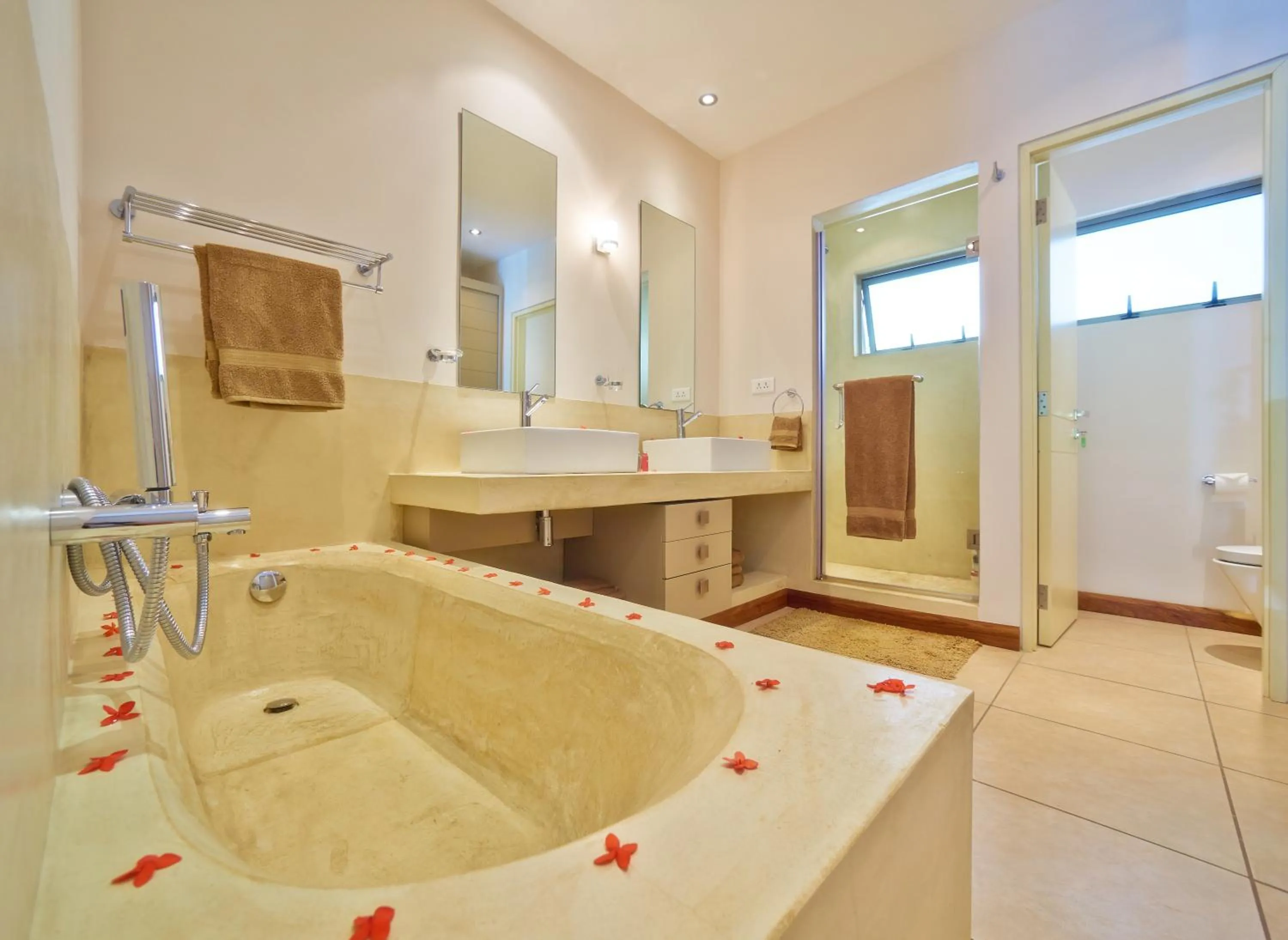 Shower in Bon Azur Beachfront Suites & Penthouses by LOV Mauritius