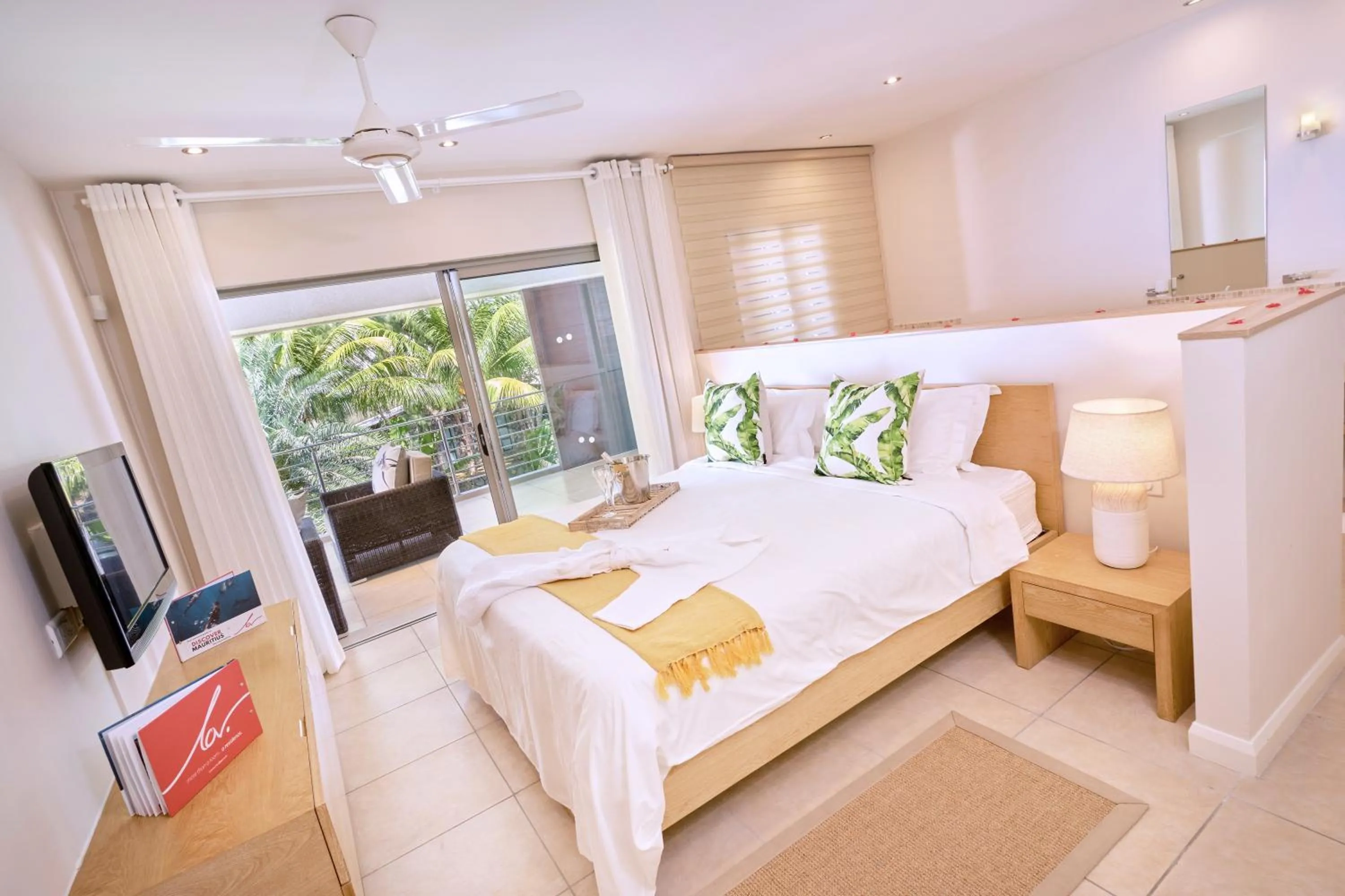 Bed in Bon Azur Beachfront Suites & Penthouses by LOV Mauritius