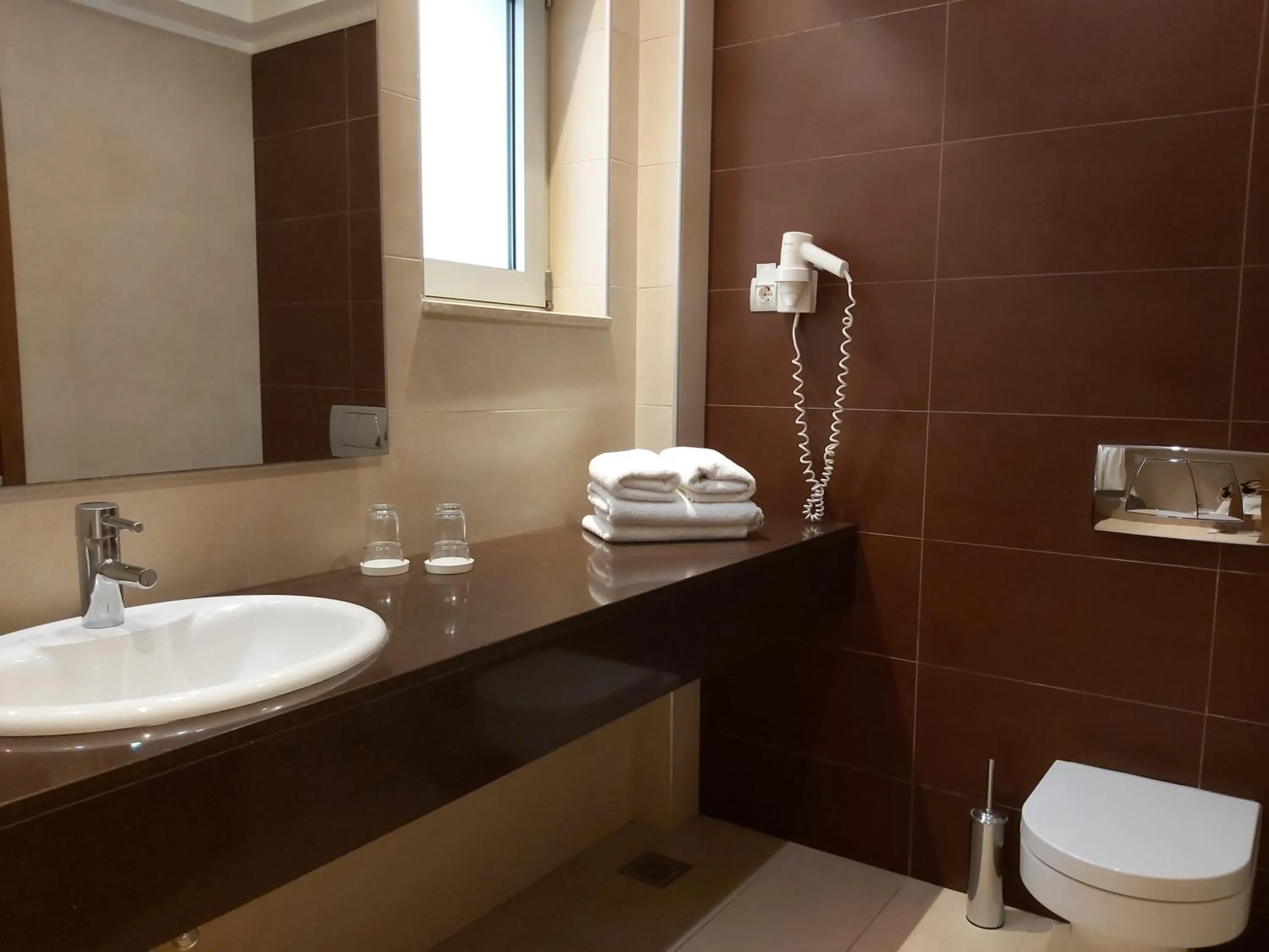 Bathroom in El Greco Hotel