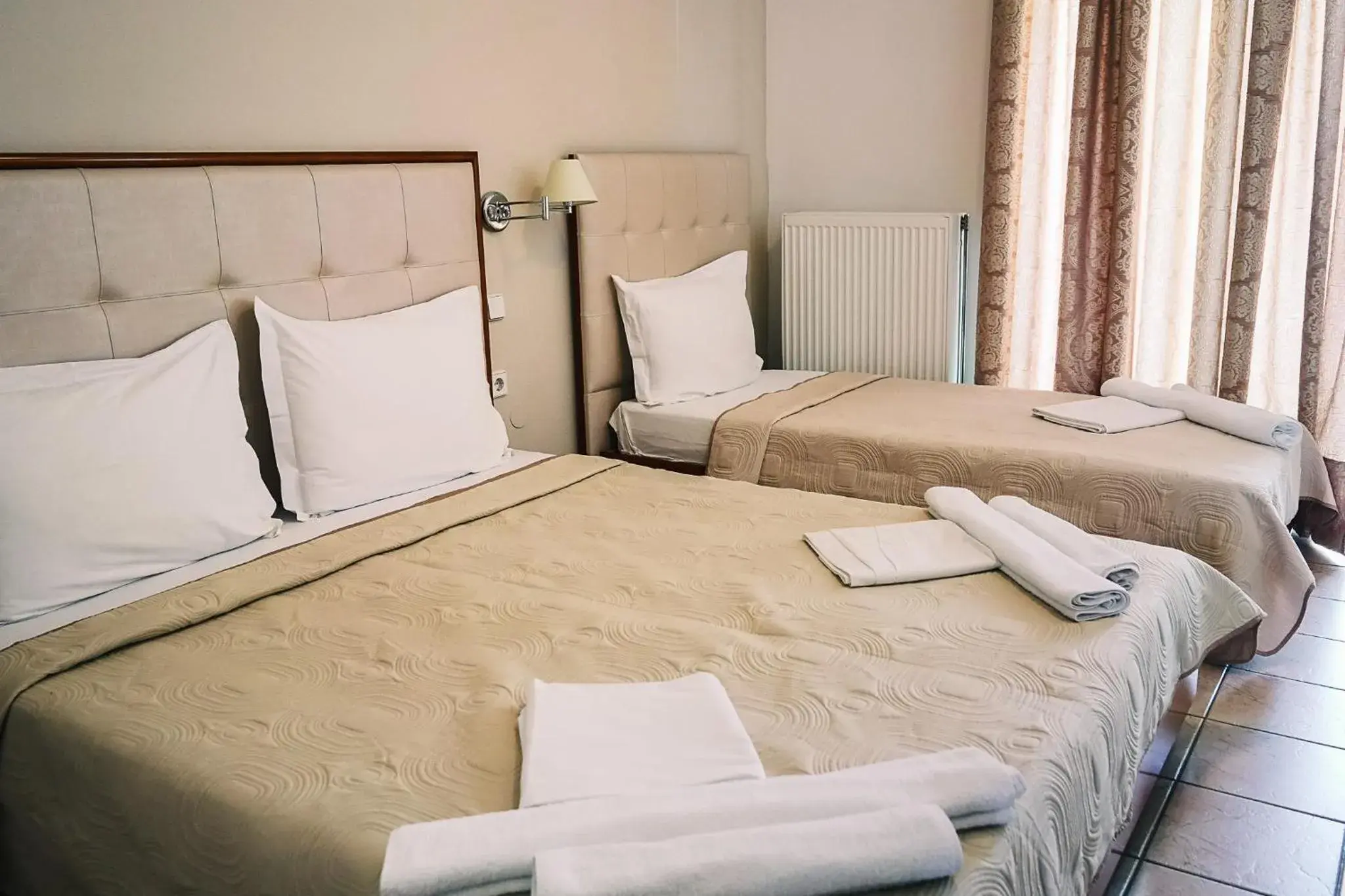 Standard Triple Room in Stavros Beach Hotel Standard Triple Room in Stavros Beach Hotel