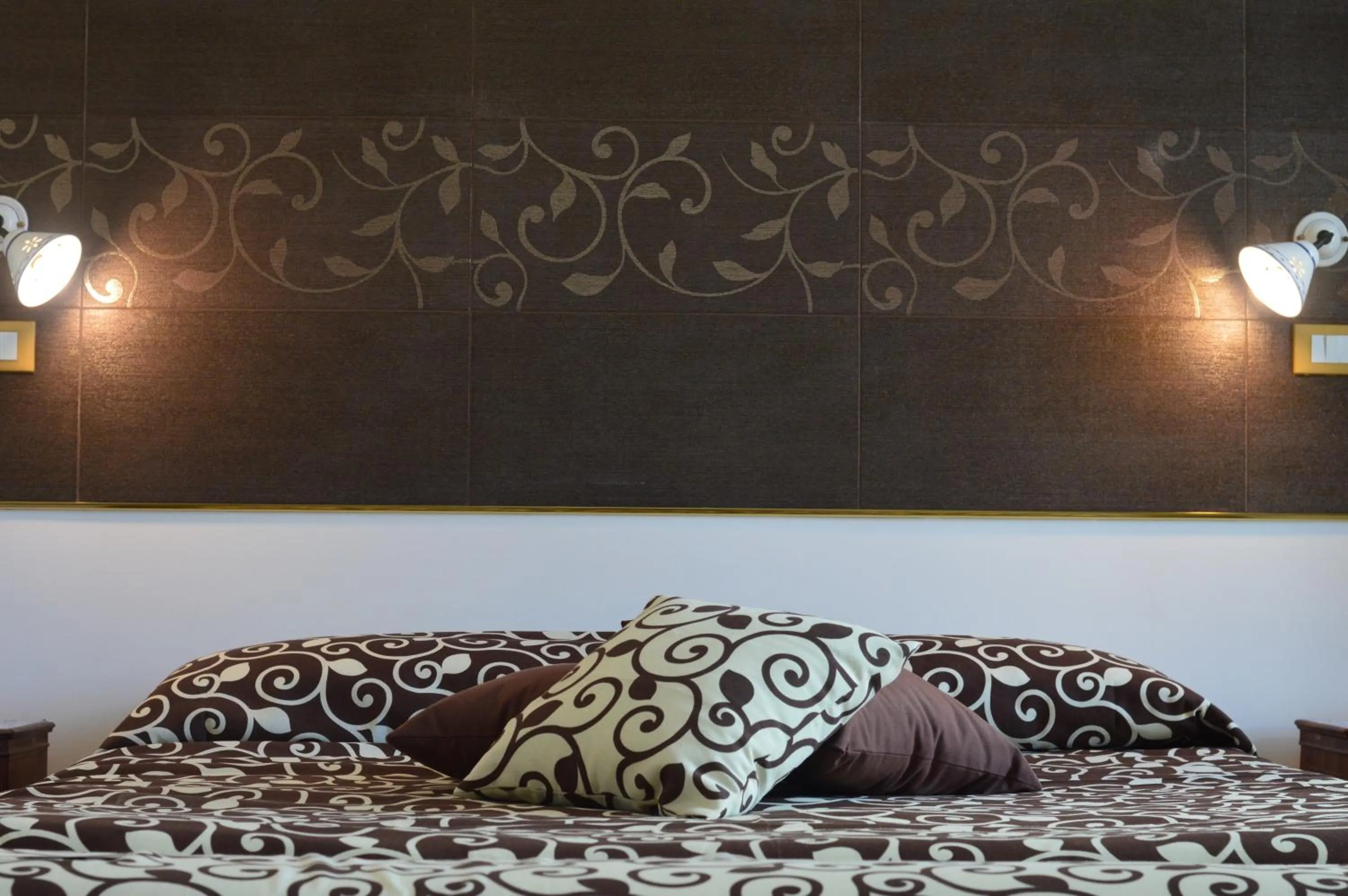 Decorative detail, Bed in Centro Sicilia Rooms-Suites & Terrace