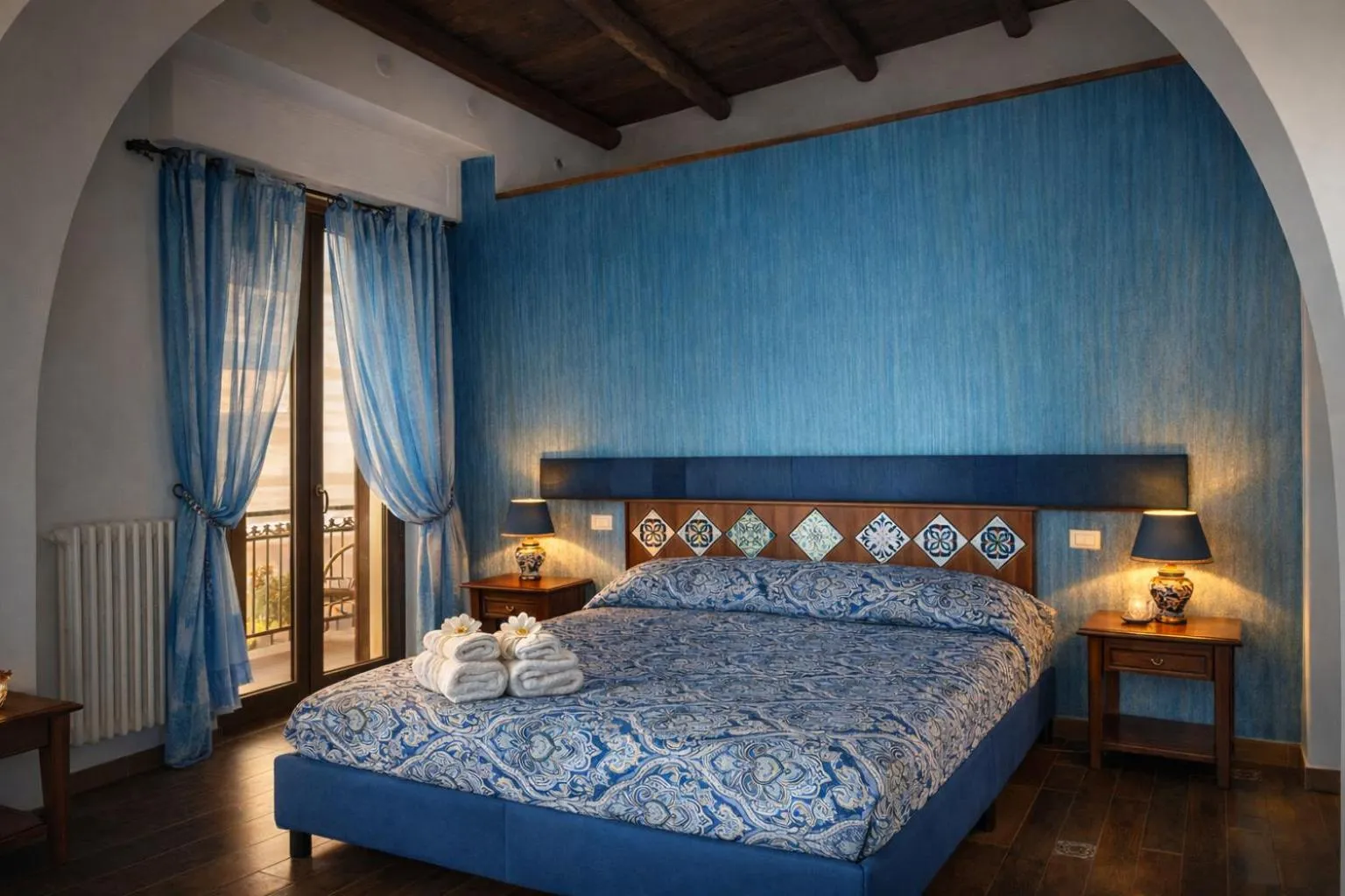 Bed in Centro Sicilia Rooms & Suites