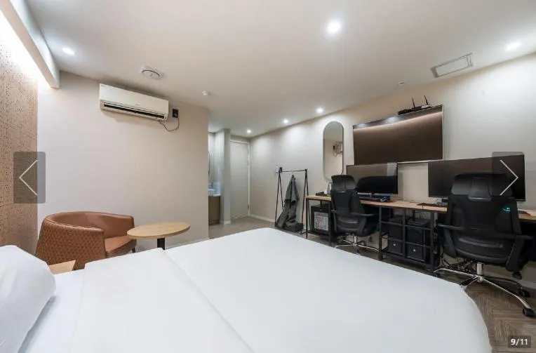 Bed in Jamsil Tomgi Hotel