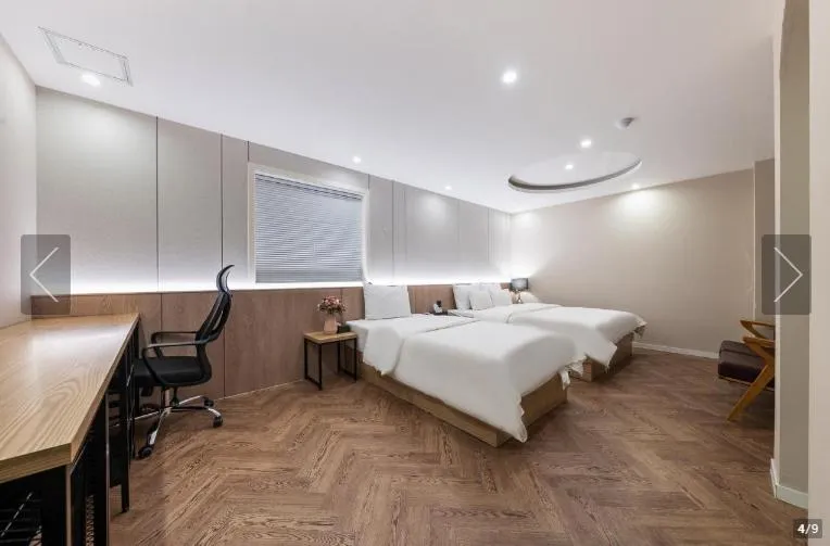 Bed in Jamsil Tomgi Hotel