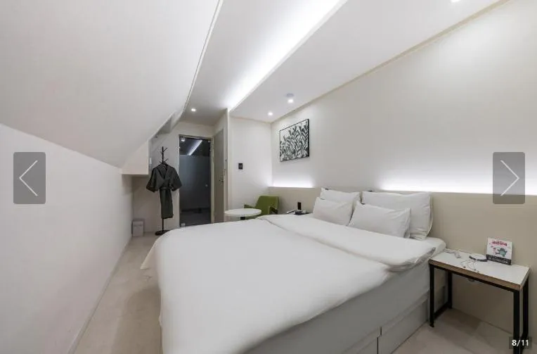 Bed in Jamsil Tomgi Hotel