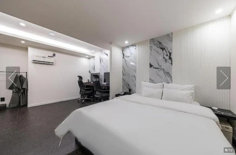 Bed in Jamsil Tomgi Hotel