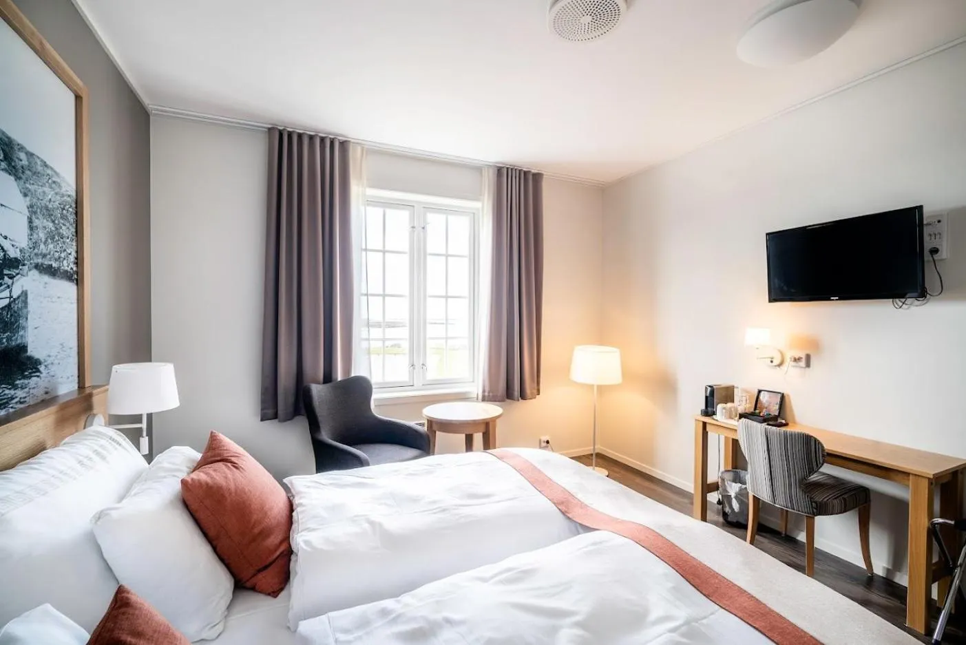 Bedroom, Bed in Finnøy Bryggehotell - by Classic Norway Hotels