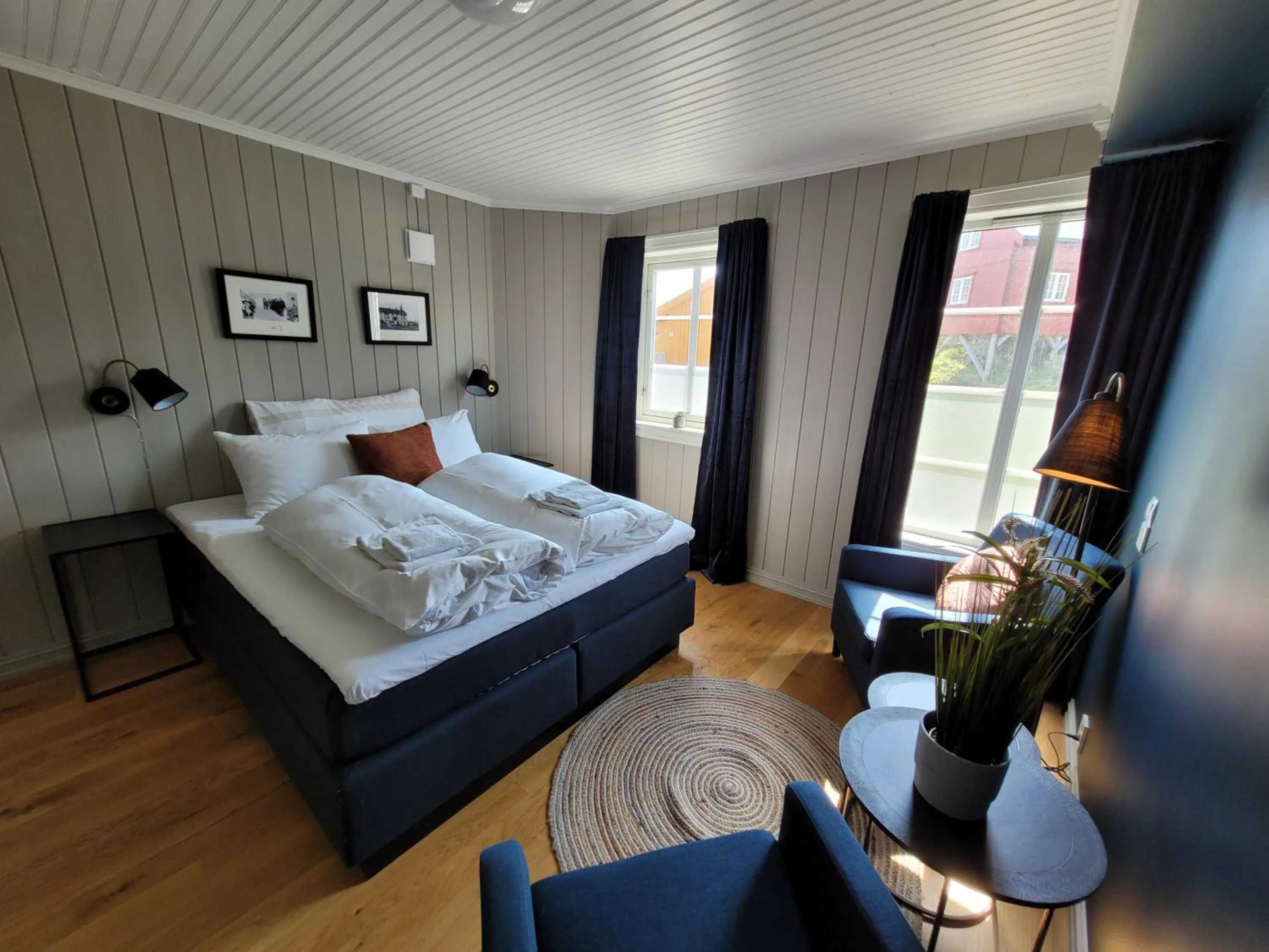 Photo of the whole room, Bed in Ona Havstuer - by Classic Norway Hotels