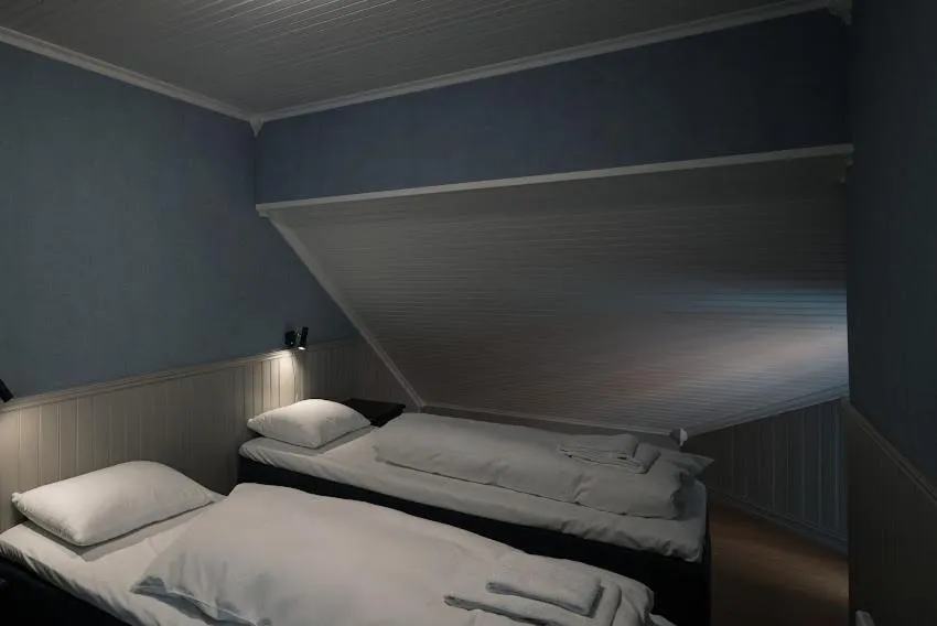 Bedroom, Bed in Ona Havstuer - by Classic Norway Hotels