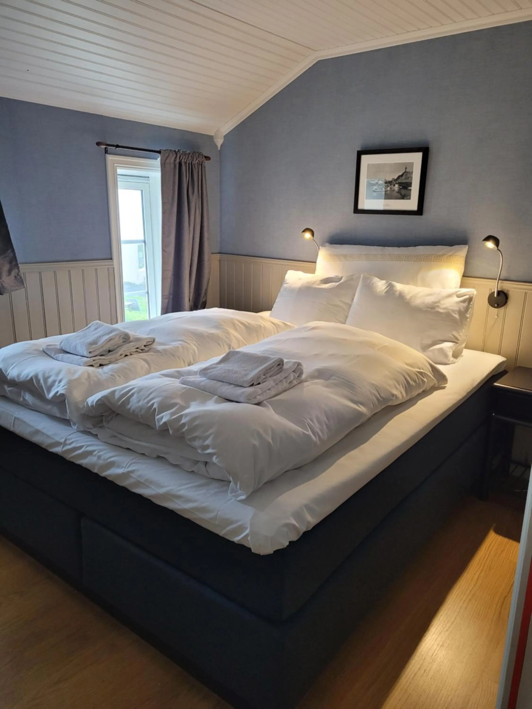 Bed in Ona Havstuer - by Classic Norway Hotels