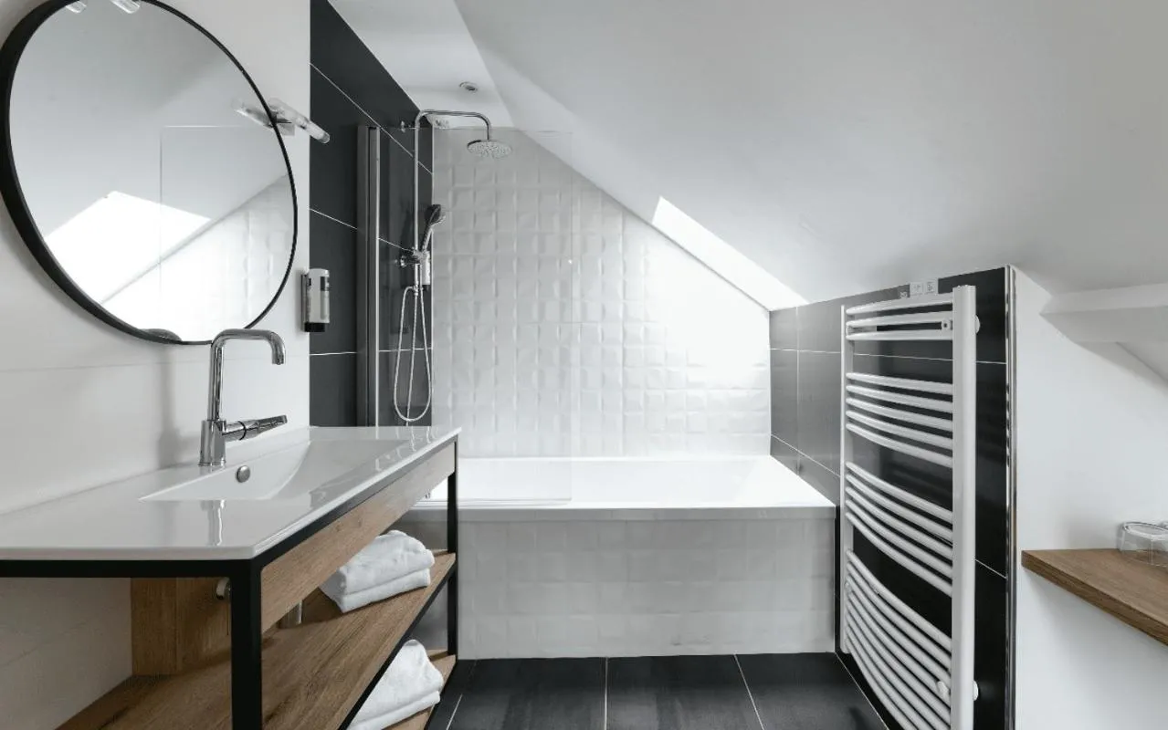 Bed in Logis Hôtel Etchemaïté