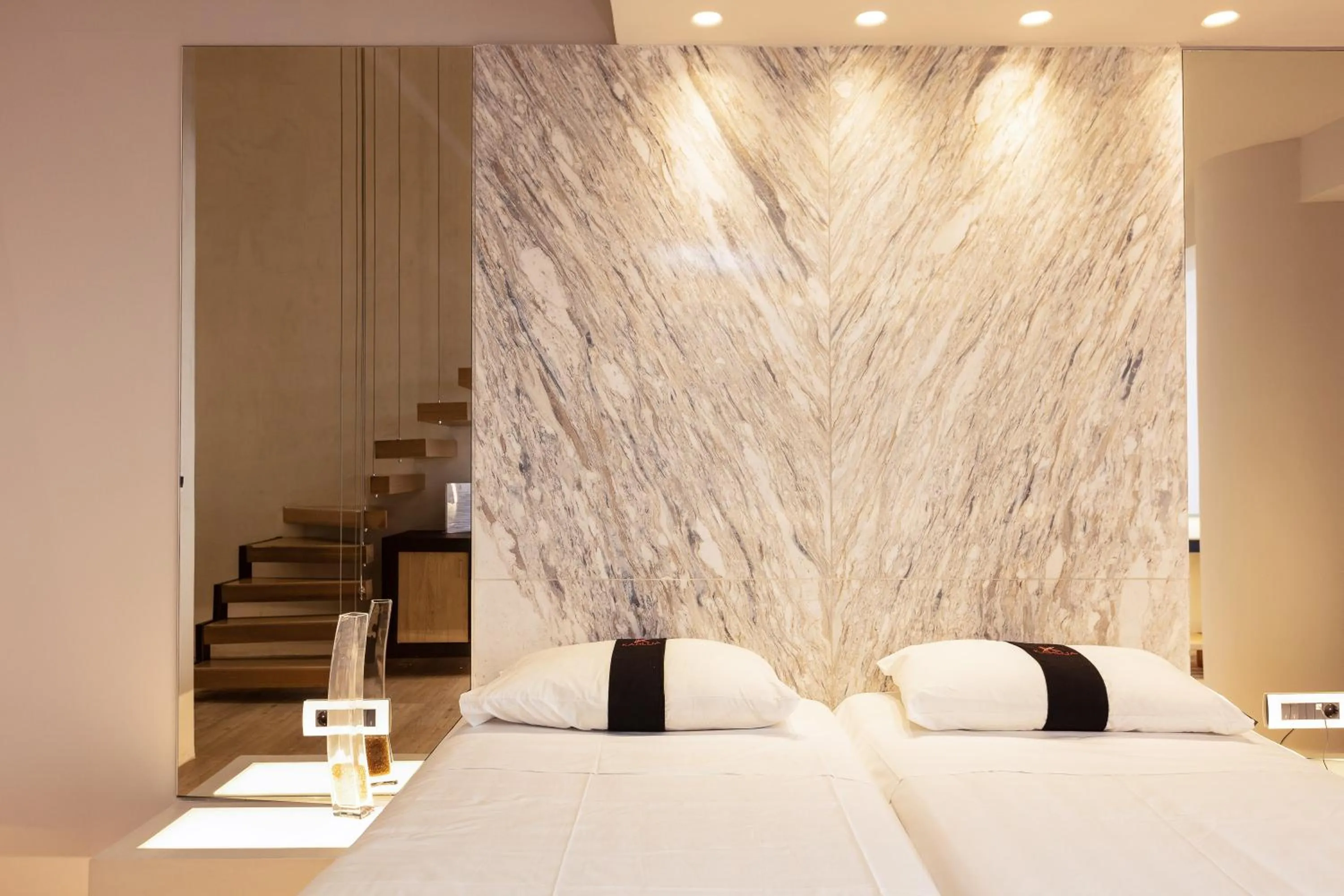 Bedroom, Bed in Kahlua Sea View Suites - Adults Only