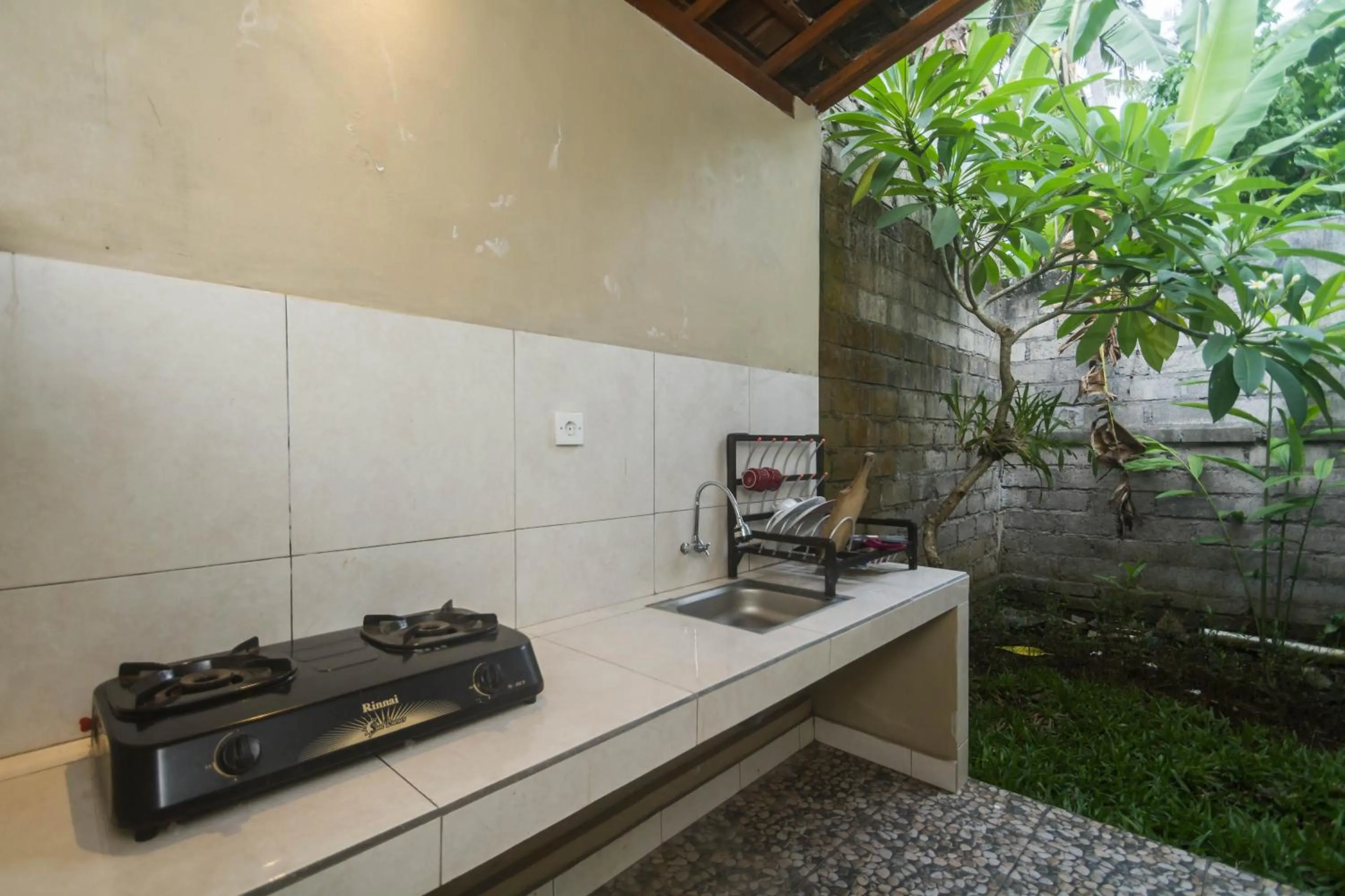 Kitchen or kitchenette in Parthi Puri Ubud