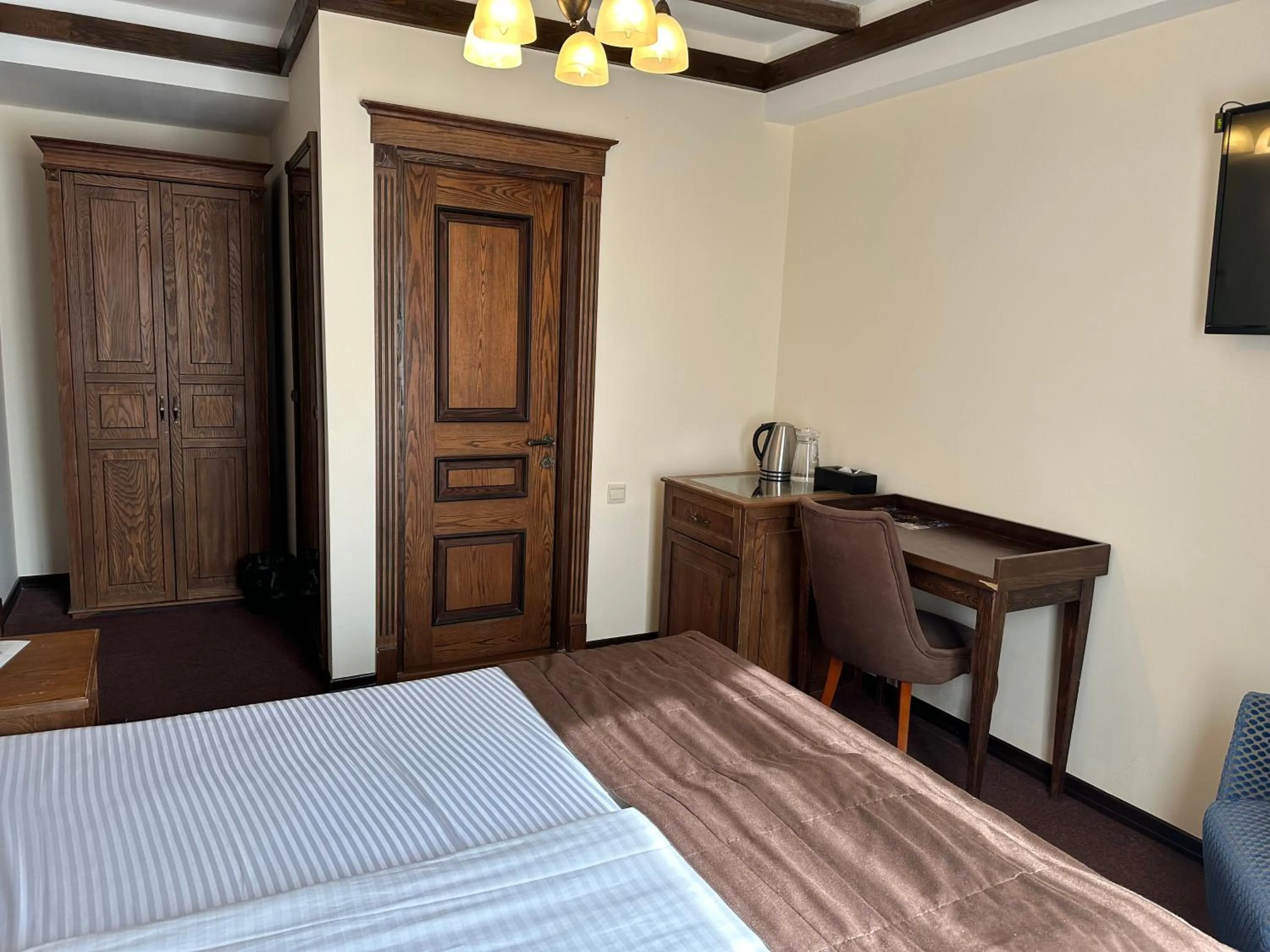 Bed in Maajid Boutique Hotel