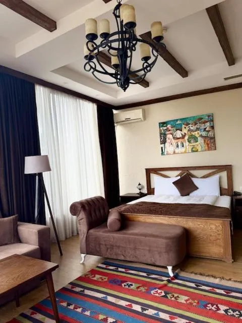 Bed in Maajid Boutique Hotel
