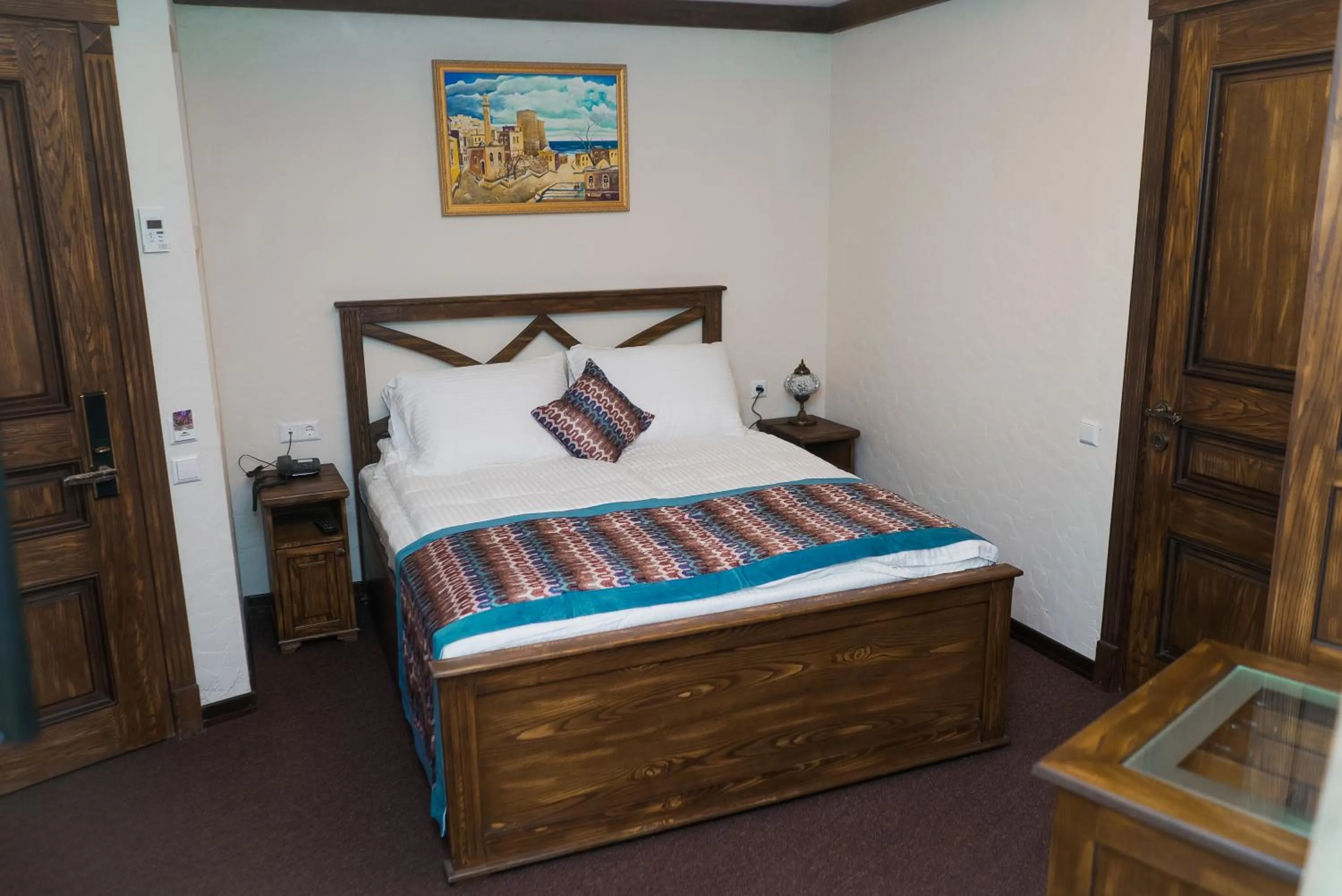 Bed in Maajid Boutique Hotel