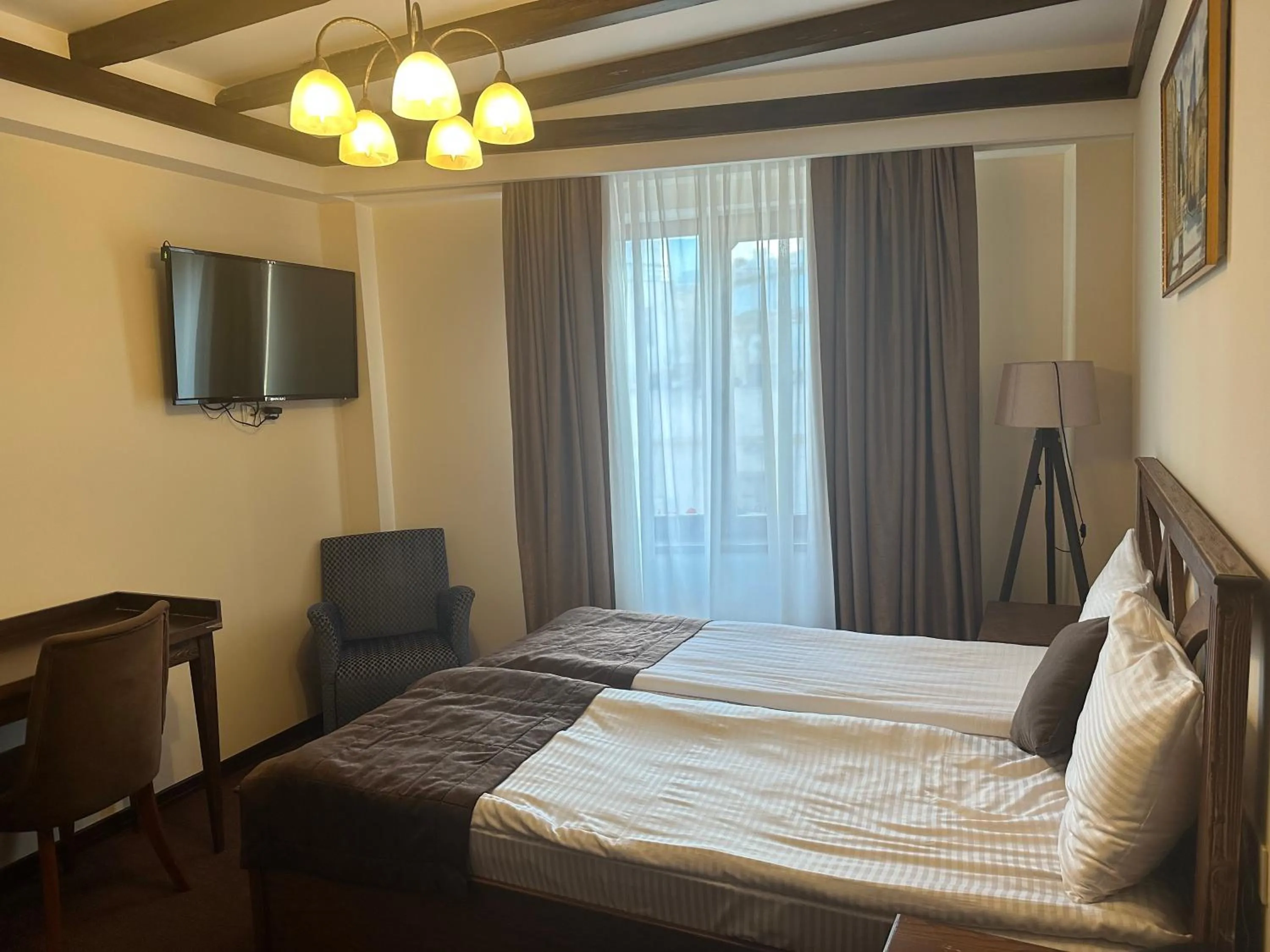 Bed in Maajid Boutique Hotel