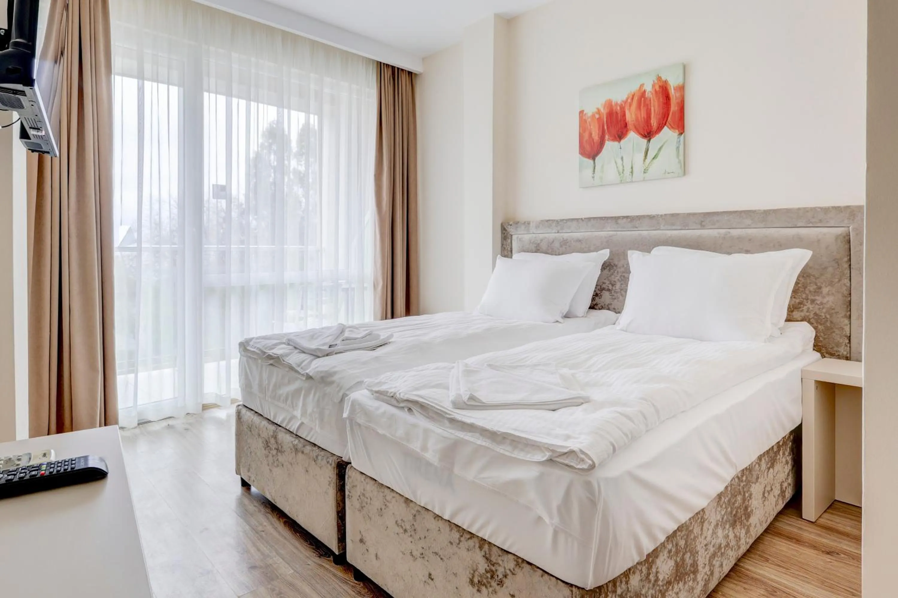 Bed in Jupiter 1 Family Hotel