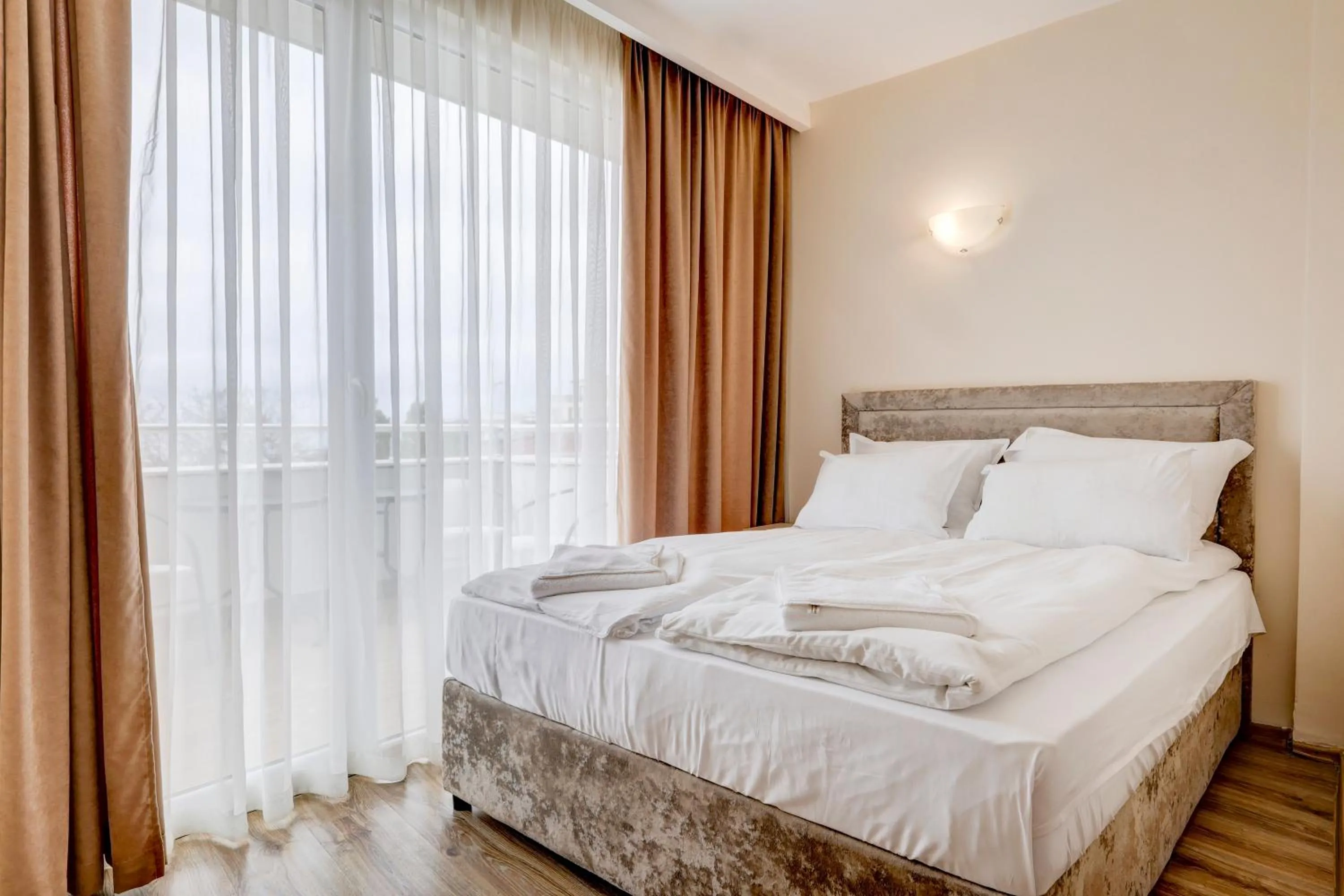 Bed in Jupiter 1 Family Hotel