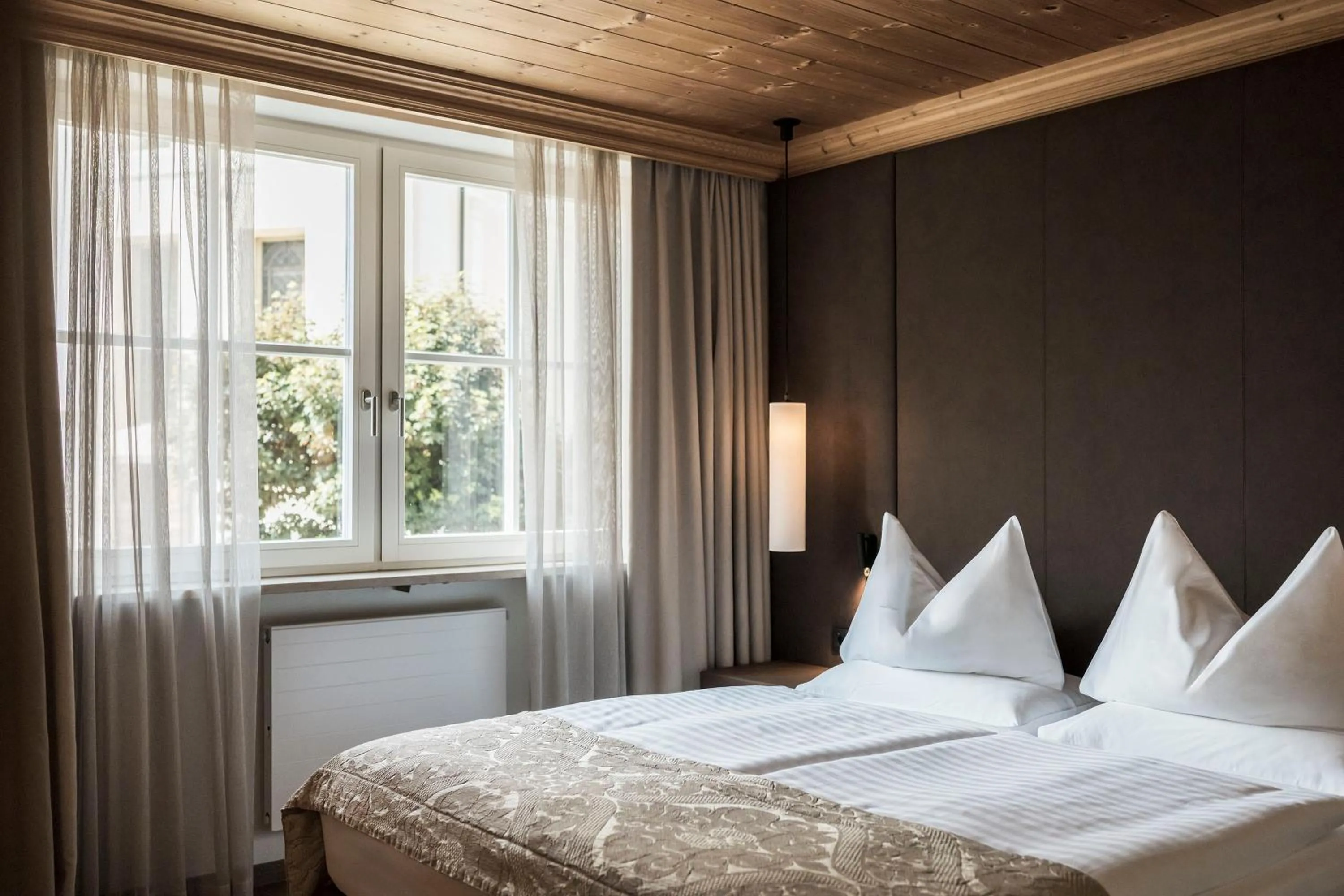 View (from property/room), Bed in Adler Spa Resort Dolomiti