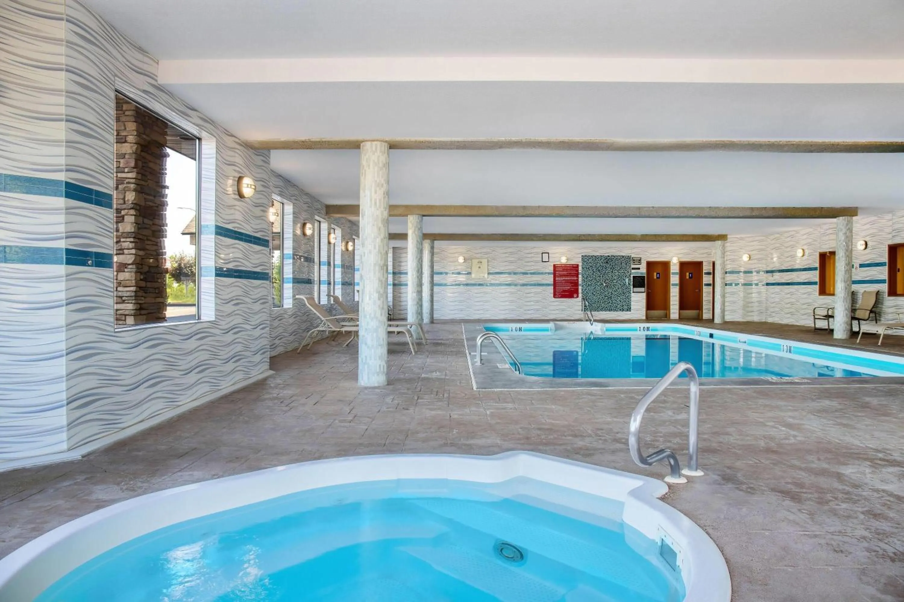Swimming pool in Days Inn & Suites by Wyndham West Edmonton