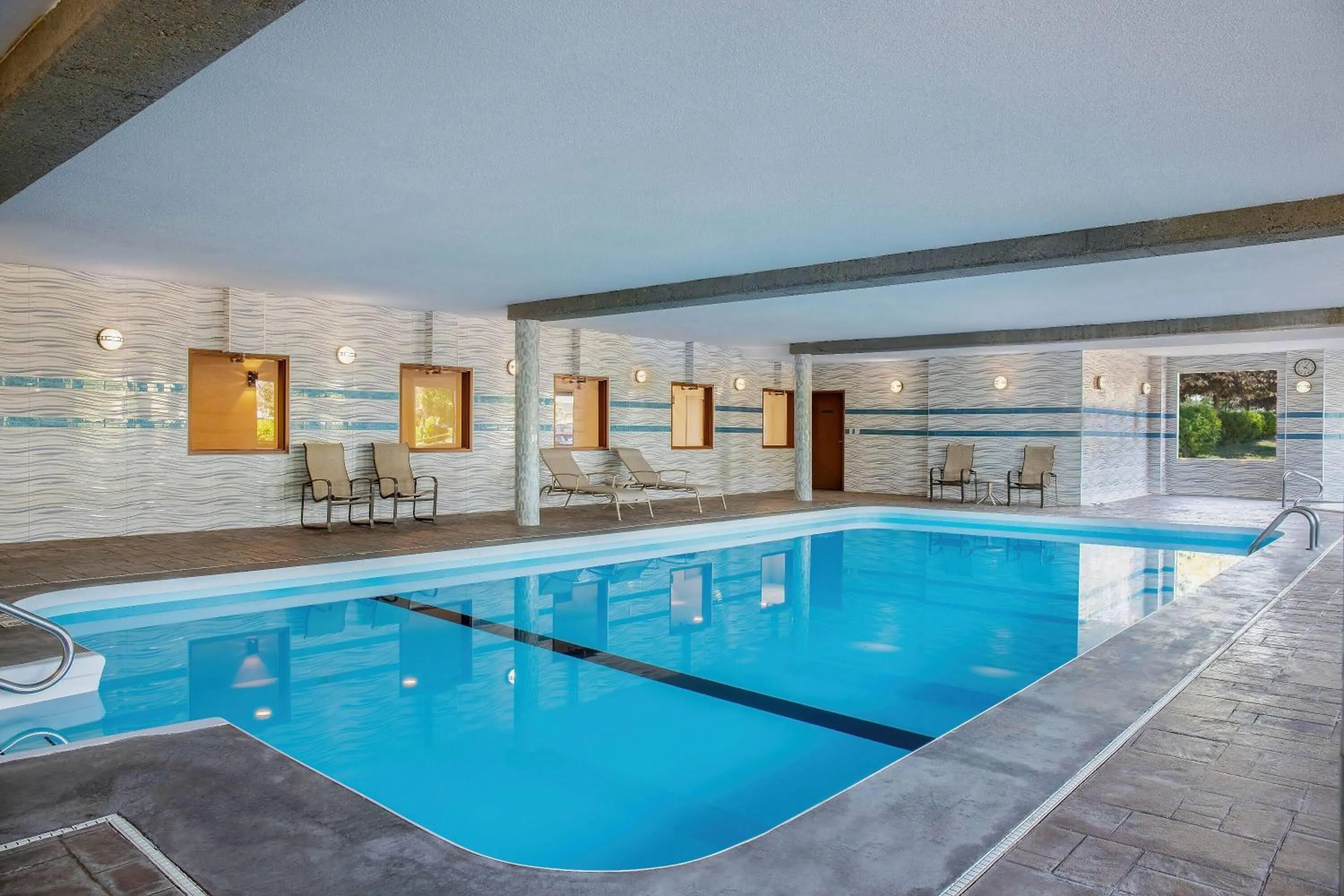 Swimming pool in Days Inn & Suites by Wyndham West Edmonton