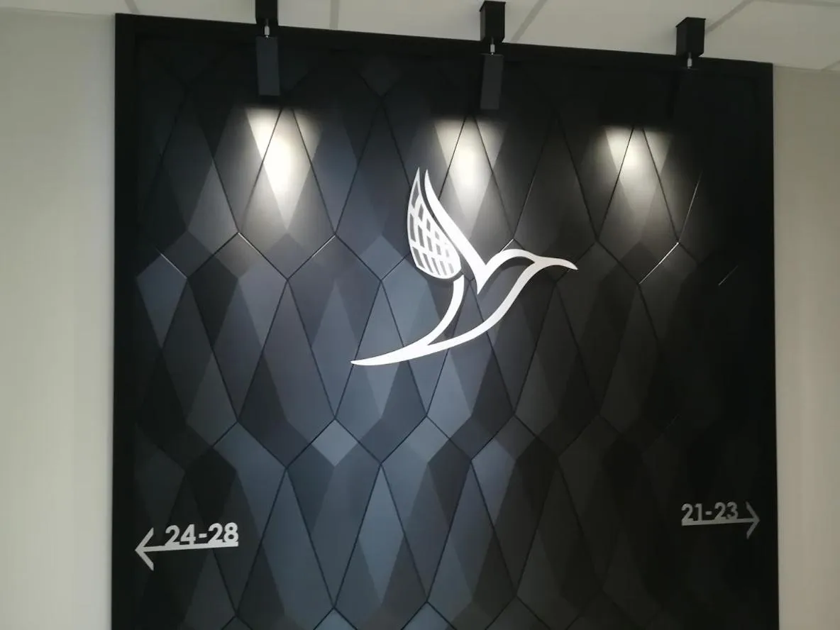 Property logo or sign in Hotel Coliber