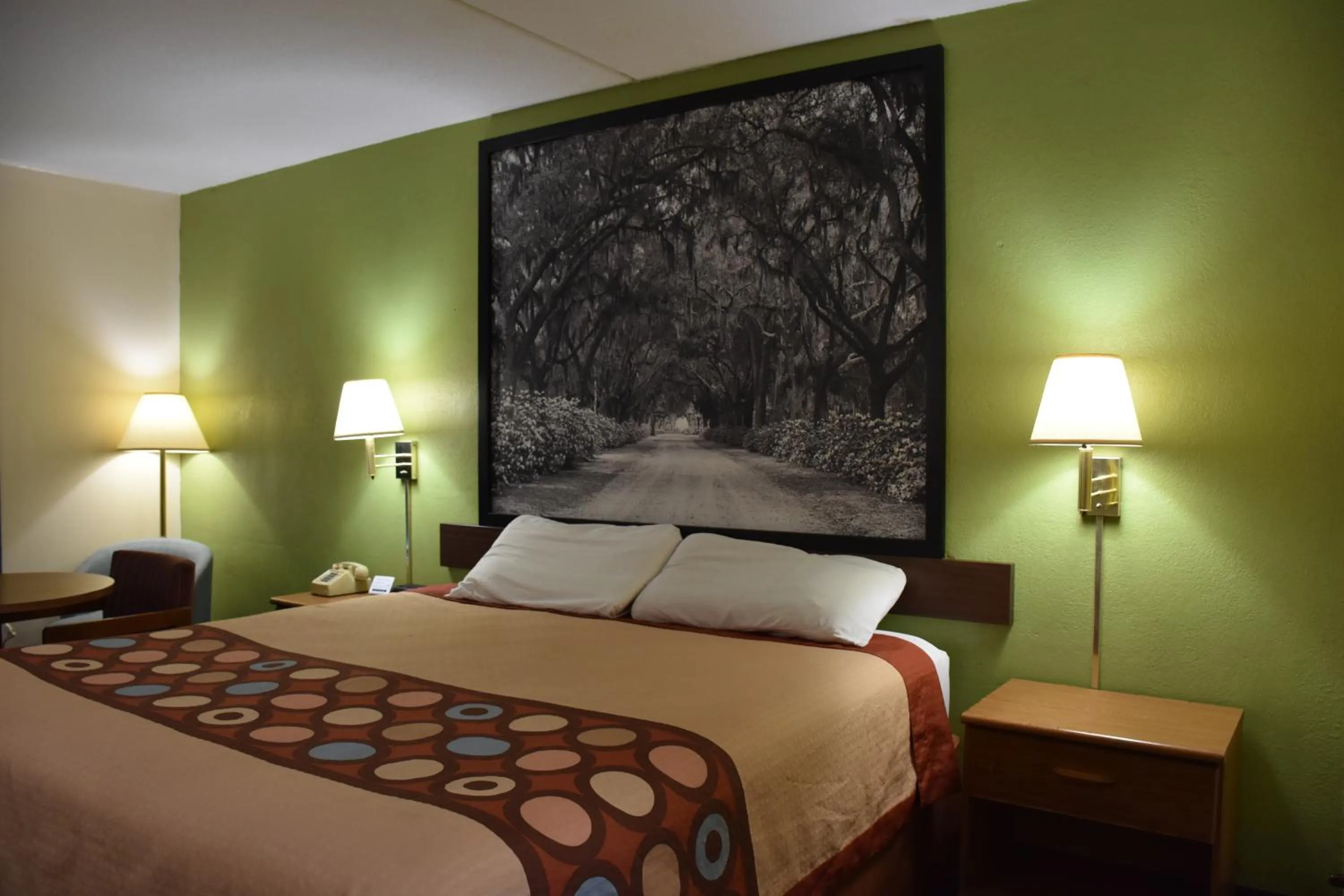 Decorative detail, Bed in Super 8 by Wyndham Tifton