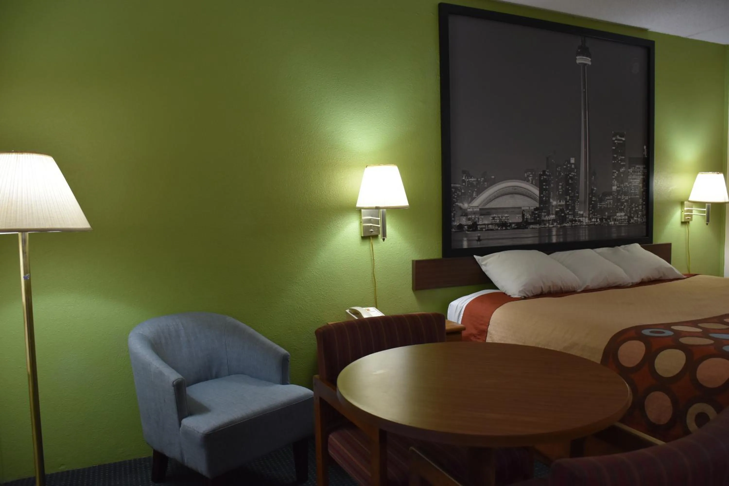 Seating area, Bed in Super 8 by Wyndham Tifton