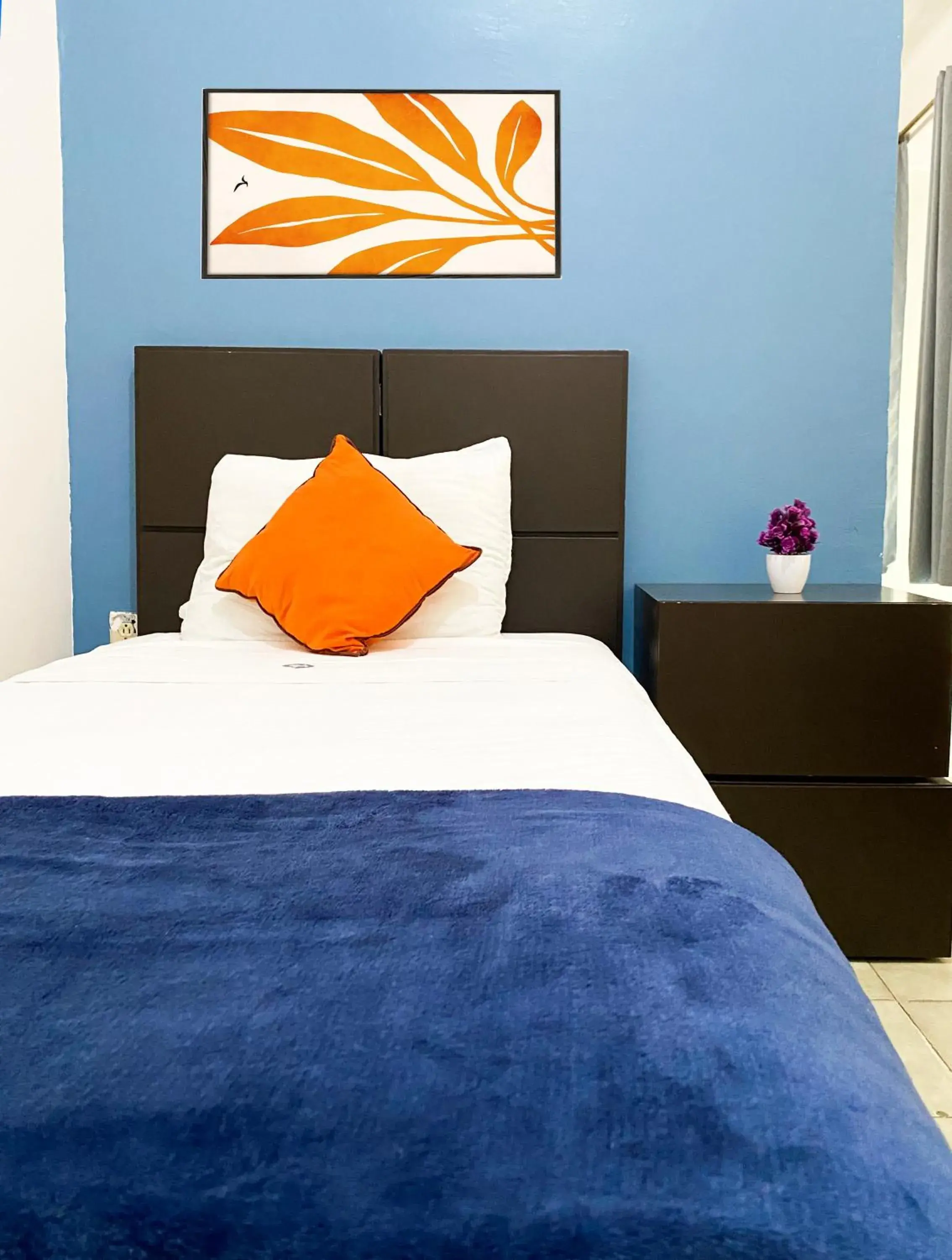 Bed in Hotel Amigo Suites Bed in Hotel Amigo Suites