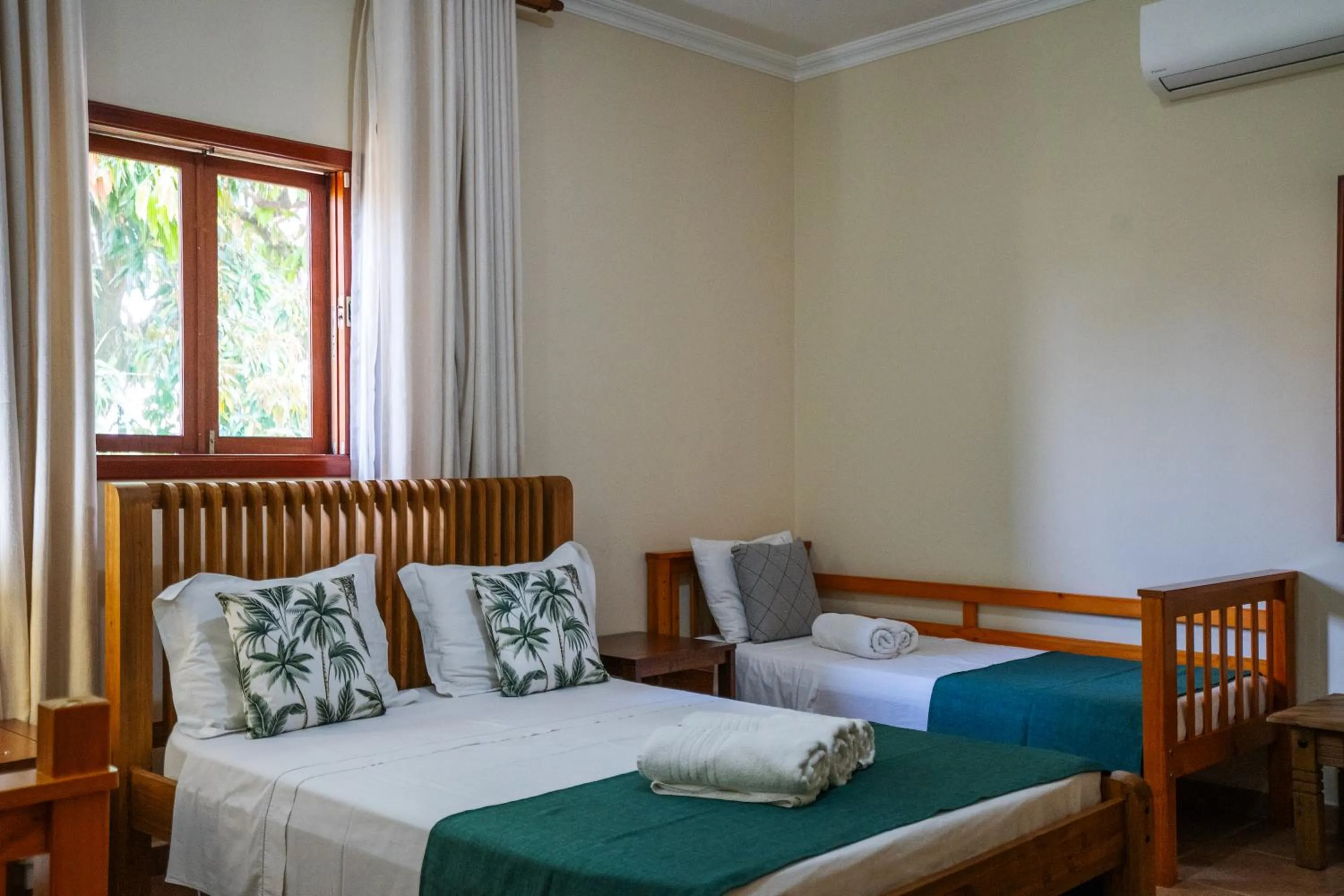 Bed in Pousada Galeria Artes