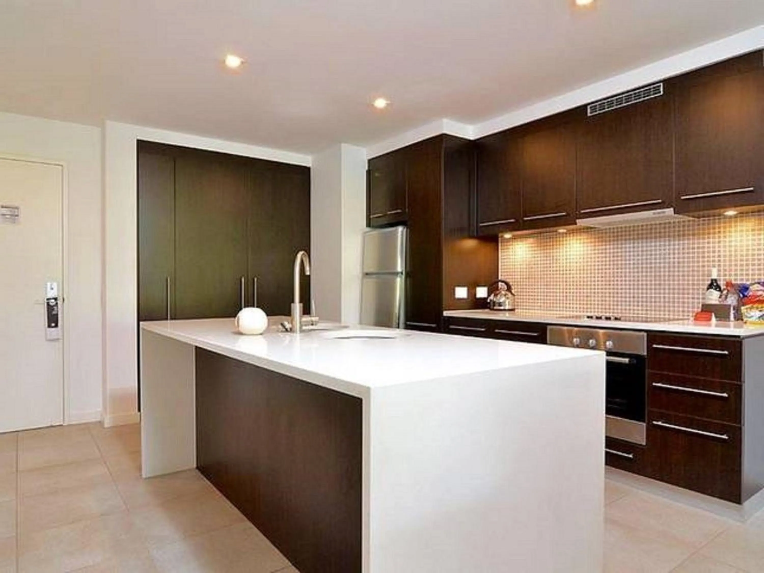 Kitchen or kitchenette in Luxury Apartments at Temple Resort and Spa Port Douglas