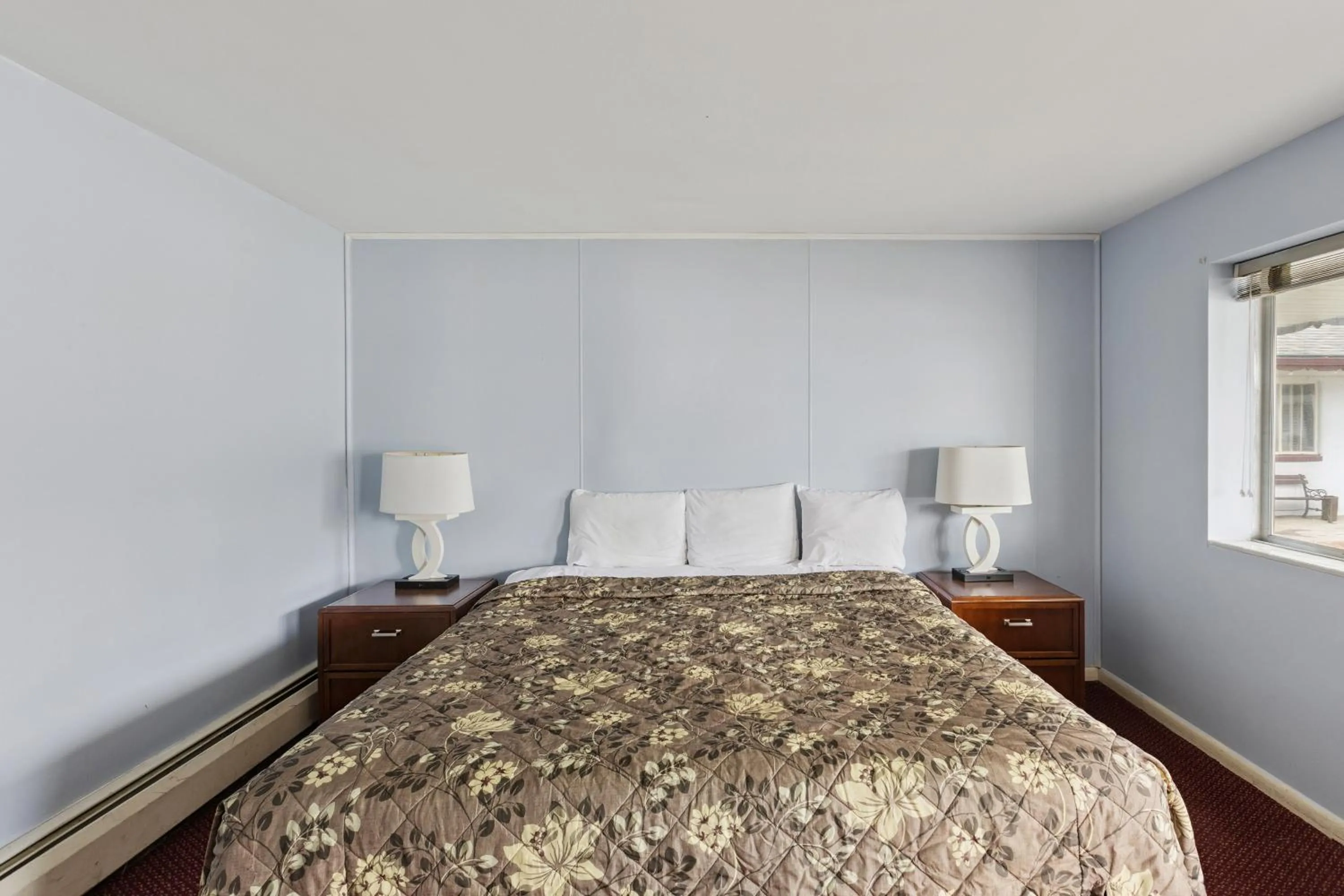 Bedroom, Bed in Heidelberg Motel by Capital O Bridgeport Frankenmuth I 75