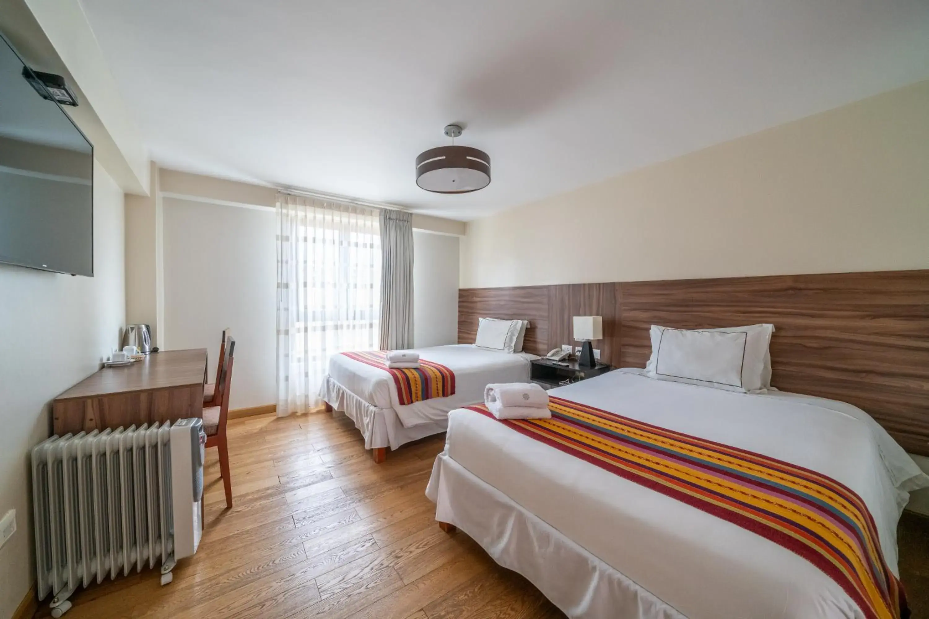 Photo of the whole room, Bed in Taypikala Hotel Cusco Photo of the whole room, Bed in Taypikala Hotel Cusco