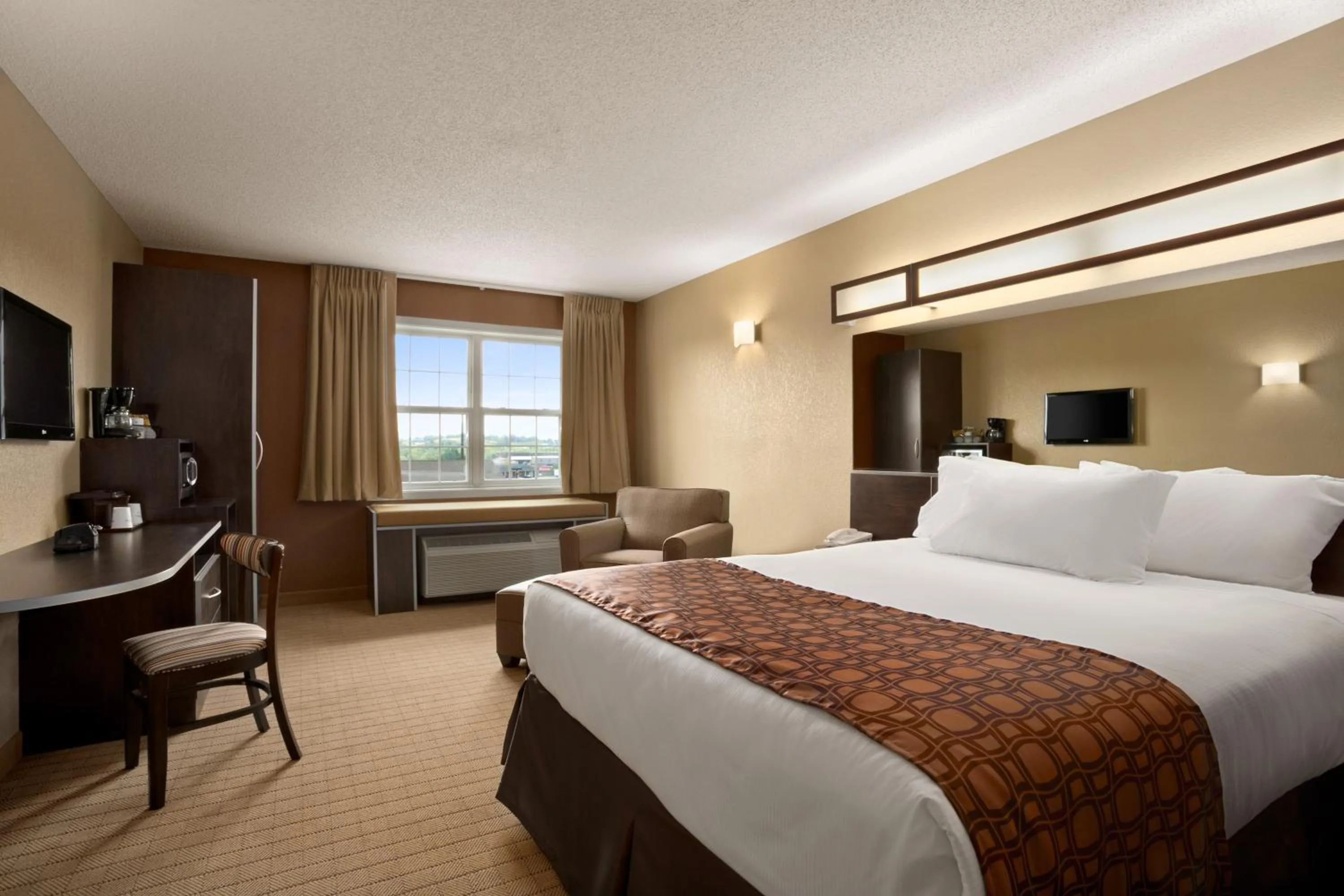 Bed in Microtel Inn & Suites By Wyndham Mineral Wells/Parkersburg