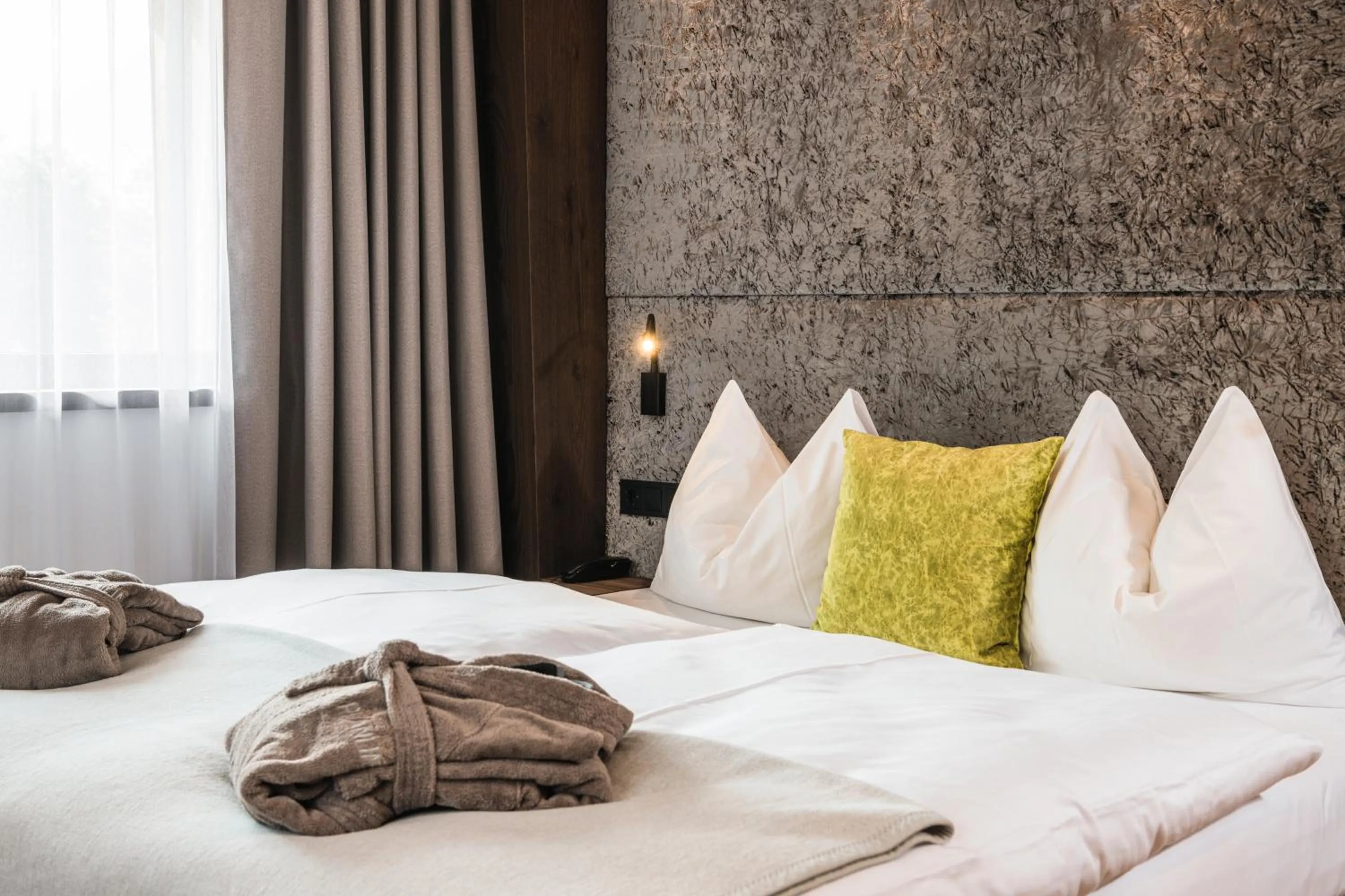 Bed in Boutique Hotel Planlim