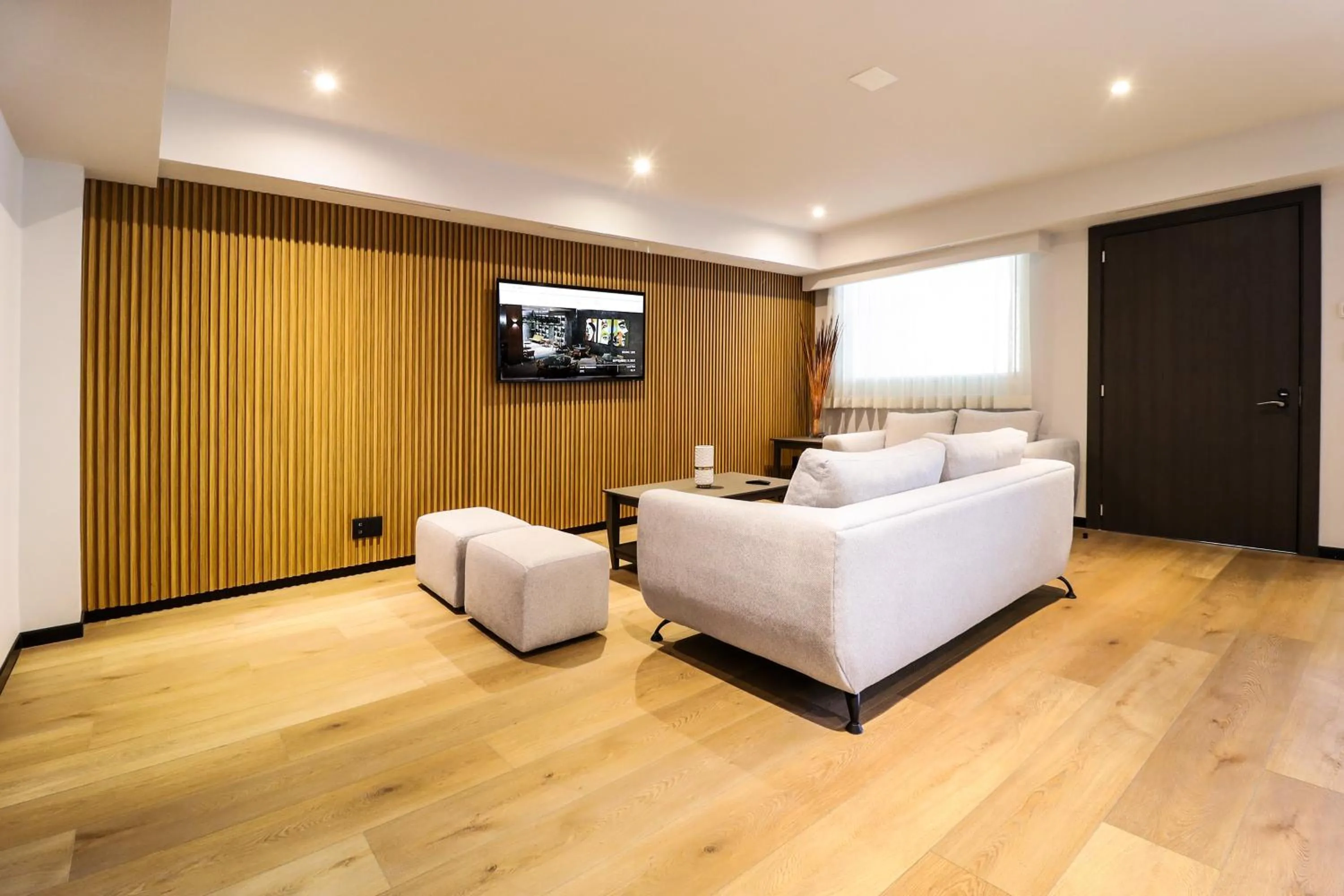 Living room, Bed in St Isidro Suites Corporate Housing SPA & Wellness Center