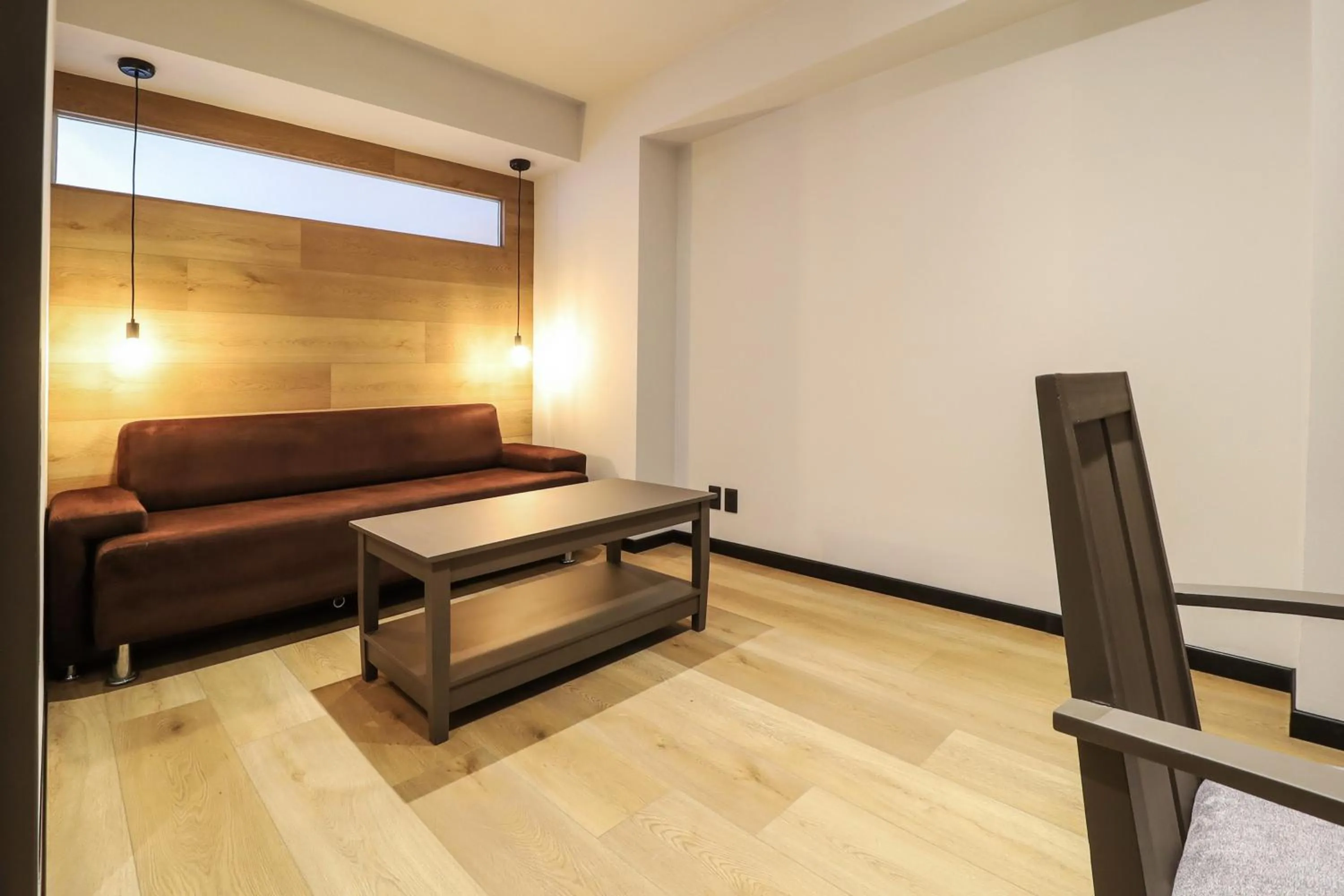 Seating area in St Isidro Suites Corporate Housing SPA & Wellness Center