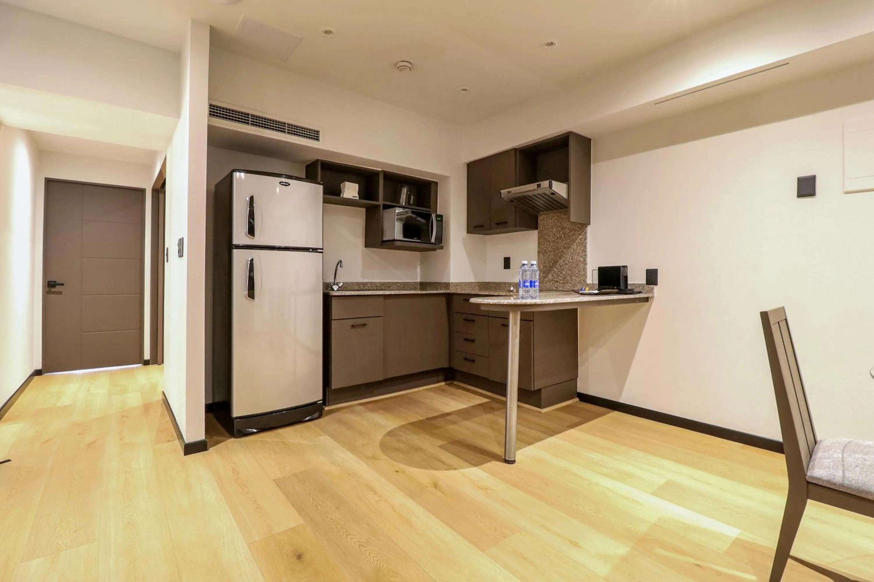 Kitchen or kitchenette in St Isidro Suites Corporate Housing SPA & Wellness Center