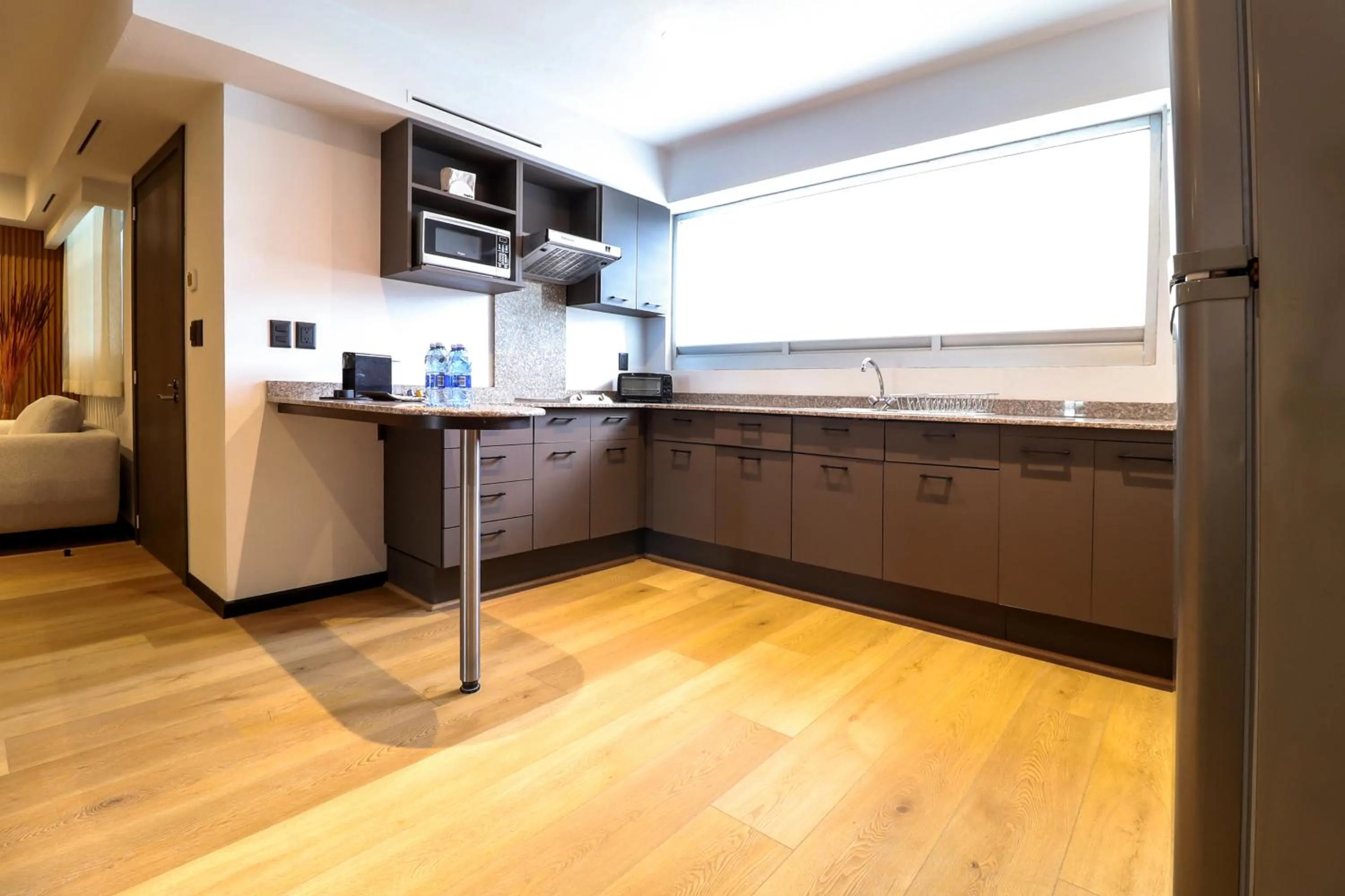 Kitchen or kitchenette in St Isidro Suites Corporate Housing SPA & Wellness Center