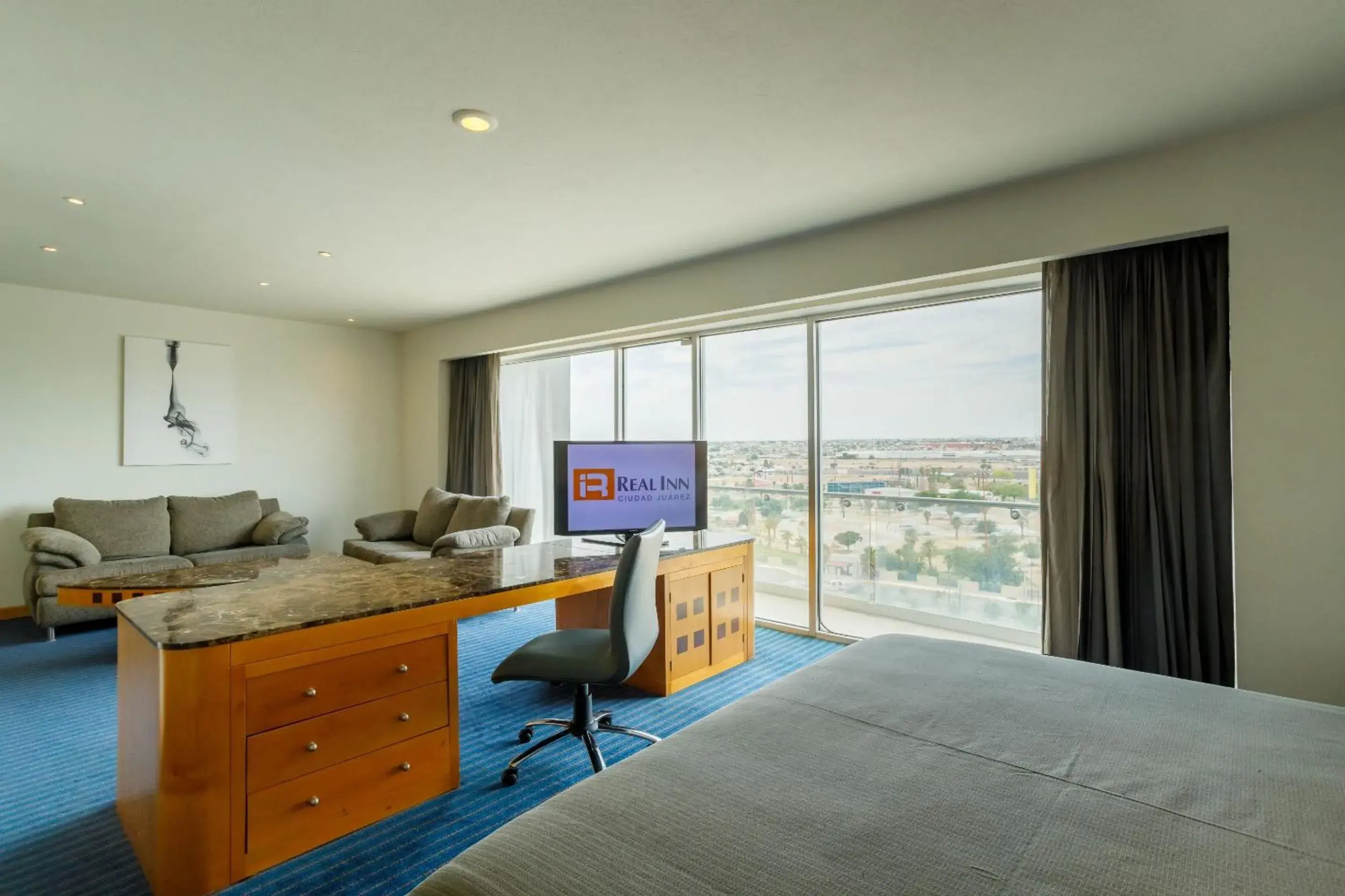 Photo of the whole room, Bed in Real Inn Ciudad Juarez by the USA Consulate Photo of the whole room, Bed in Real Inn Ciudad Juarez by the USA Consulate