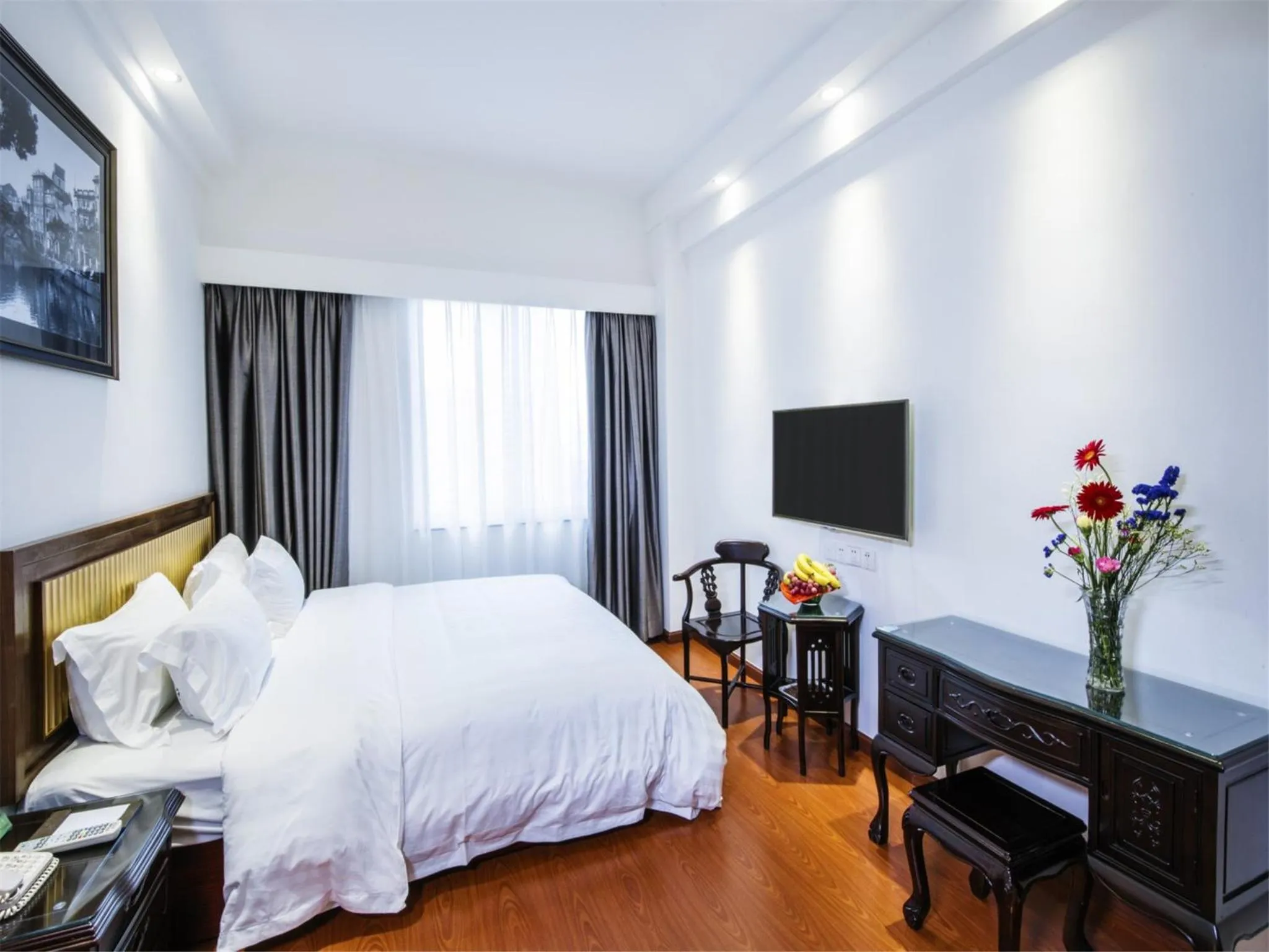 Bedroom, TV/Entertainment Center in Zhuhai Special Economic Zone Hotel