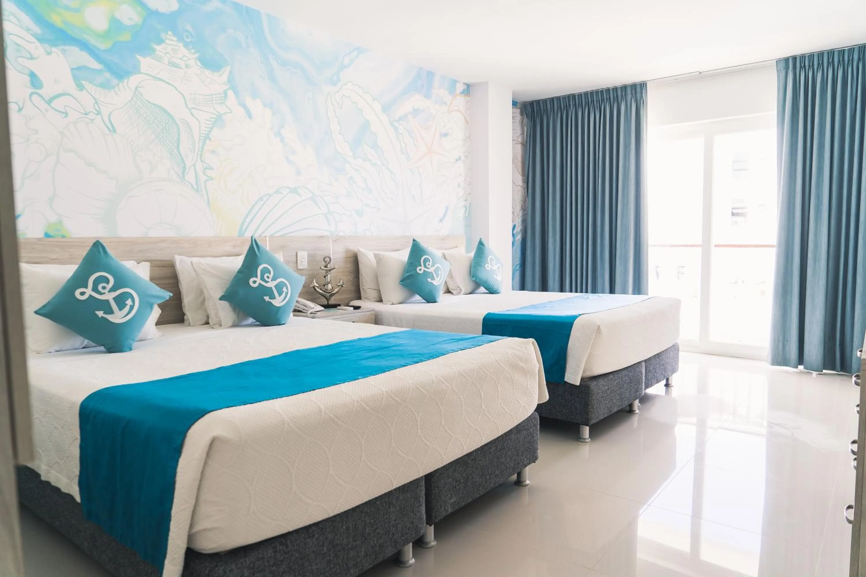 Photo of the whole room, Bed in Sea Colors Hotel