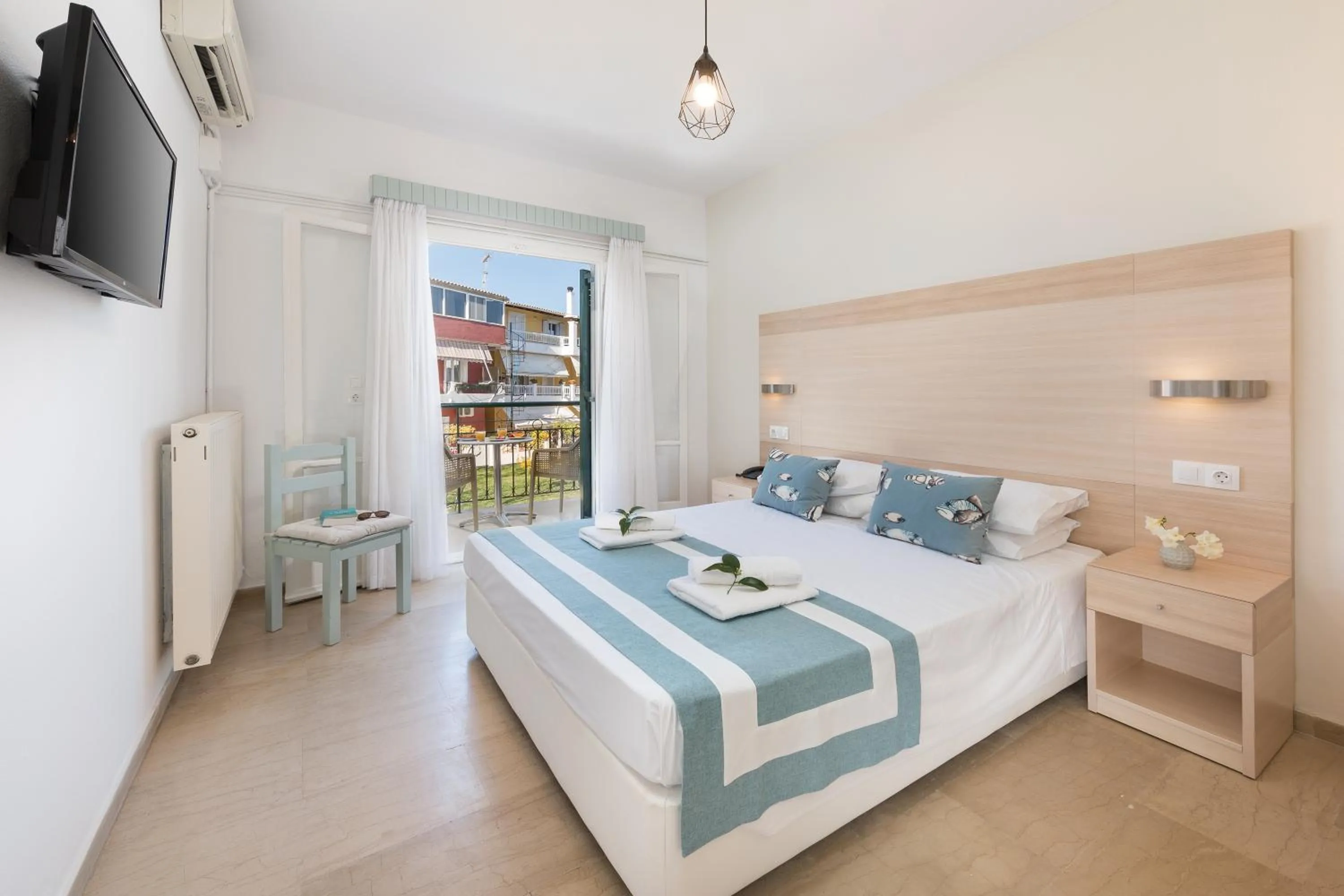 Bedroom, Bed in Iliada Beach Hotel