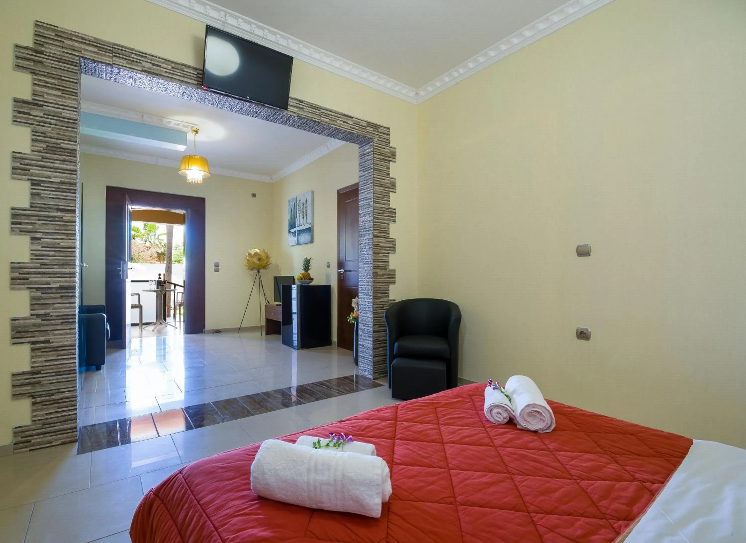 Seating area, Bed in Paradice Hotel Luxury Suites-Near zorbas Beach-FREE Breakfast