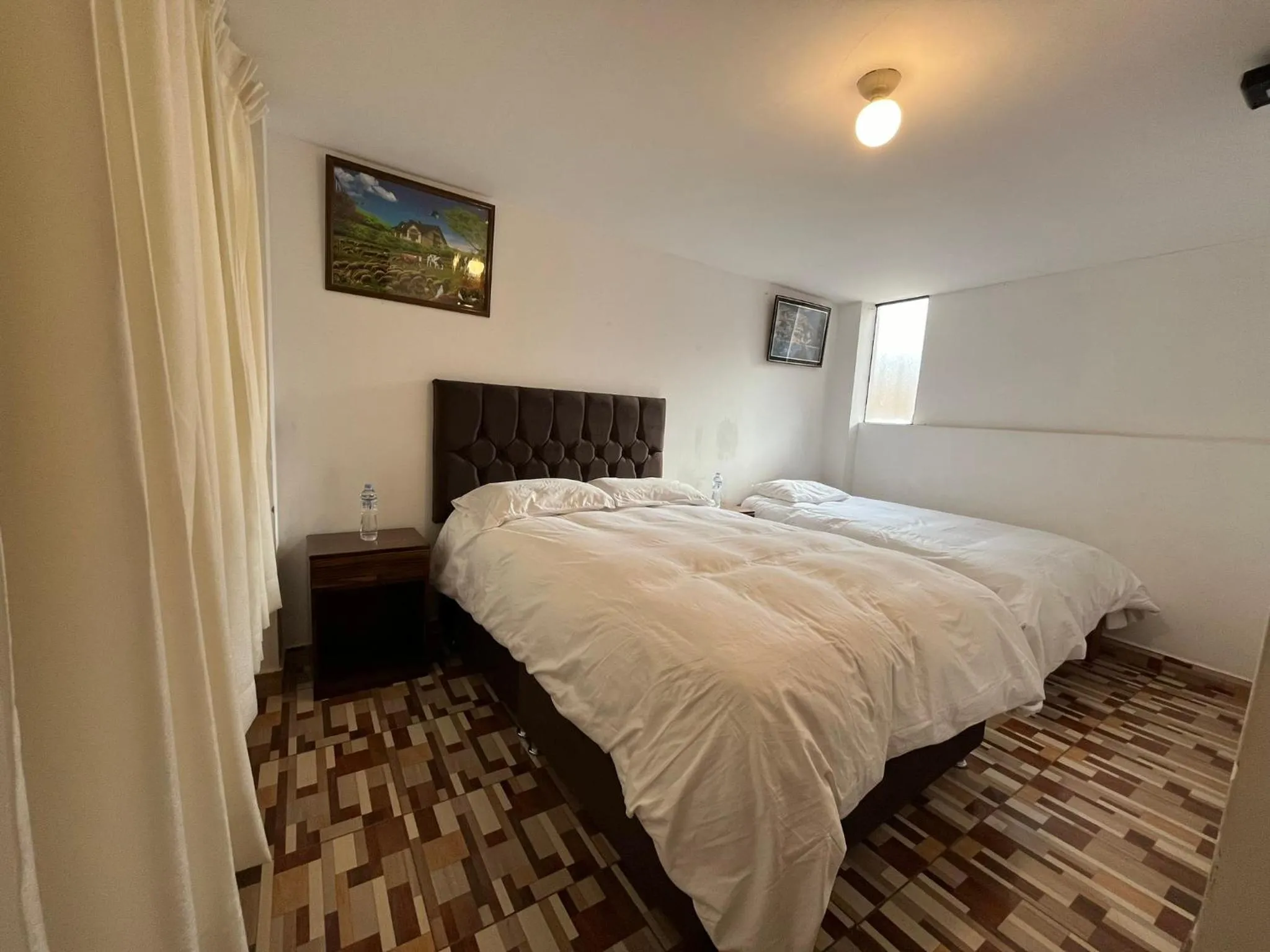 Bed in Hostal Apu Qhawarina